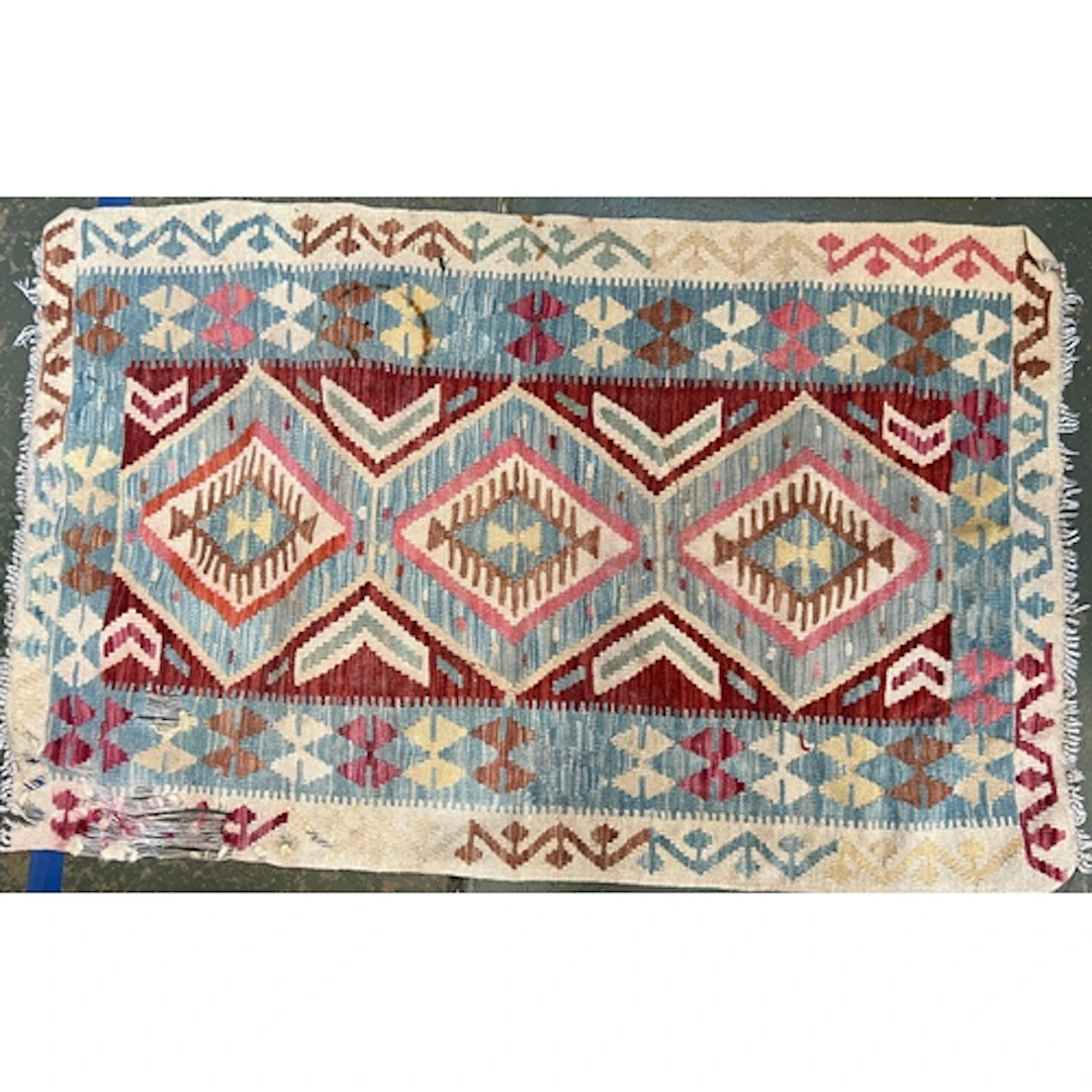 A small flatweave Kilim style rug, 141x90cm; together with a...