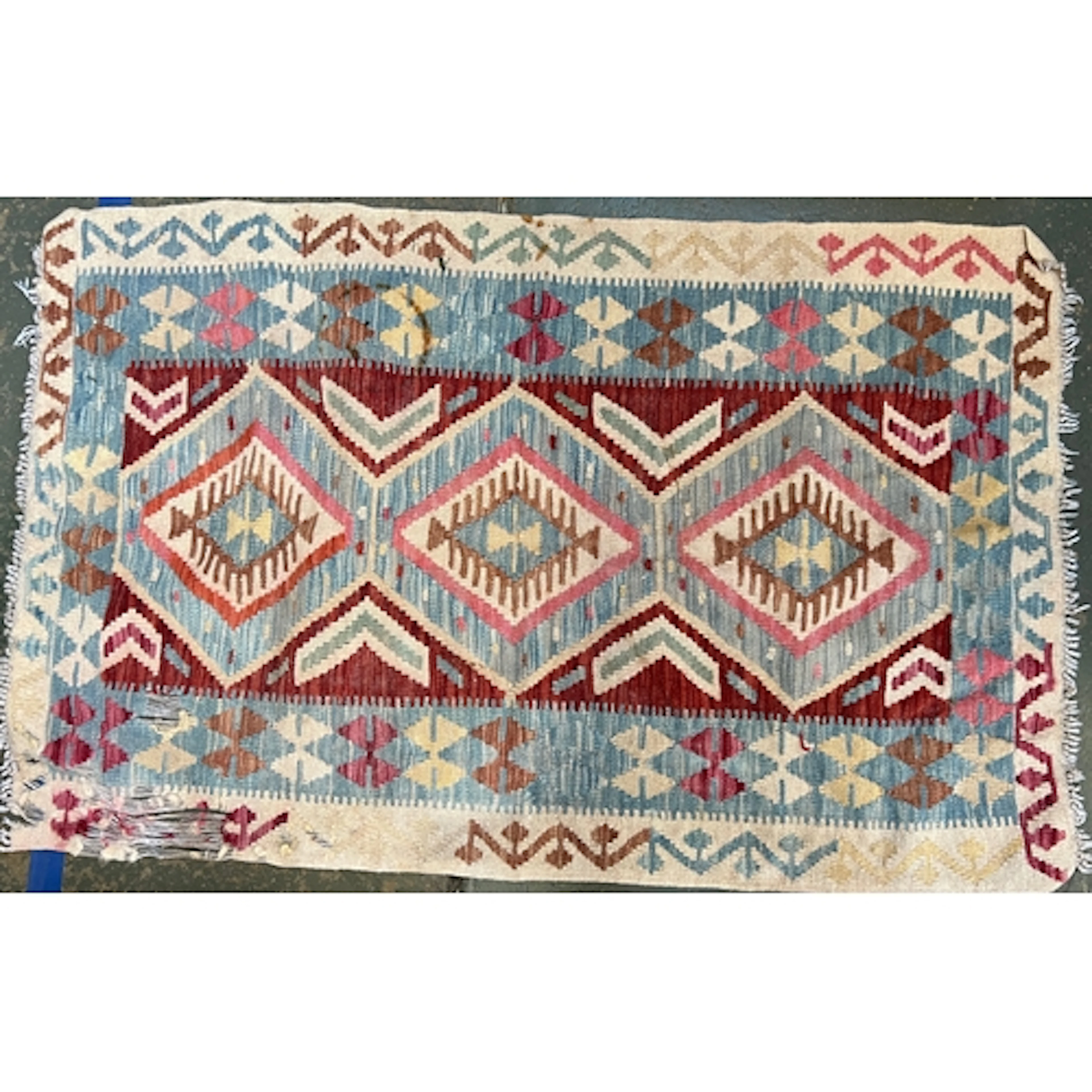A small flatweave Kilim style rug, 141x90cm; together with a...