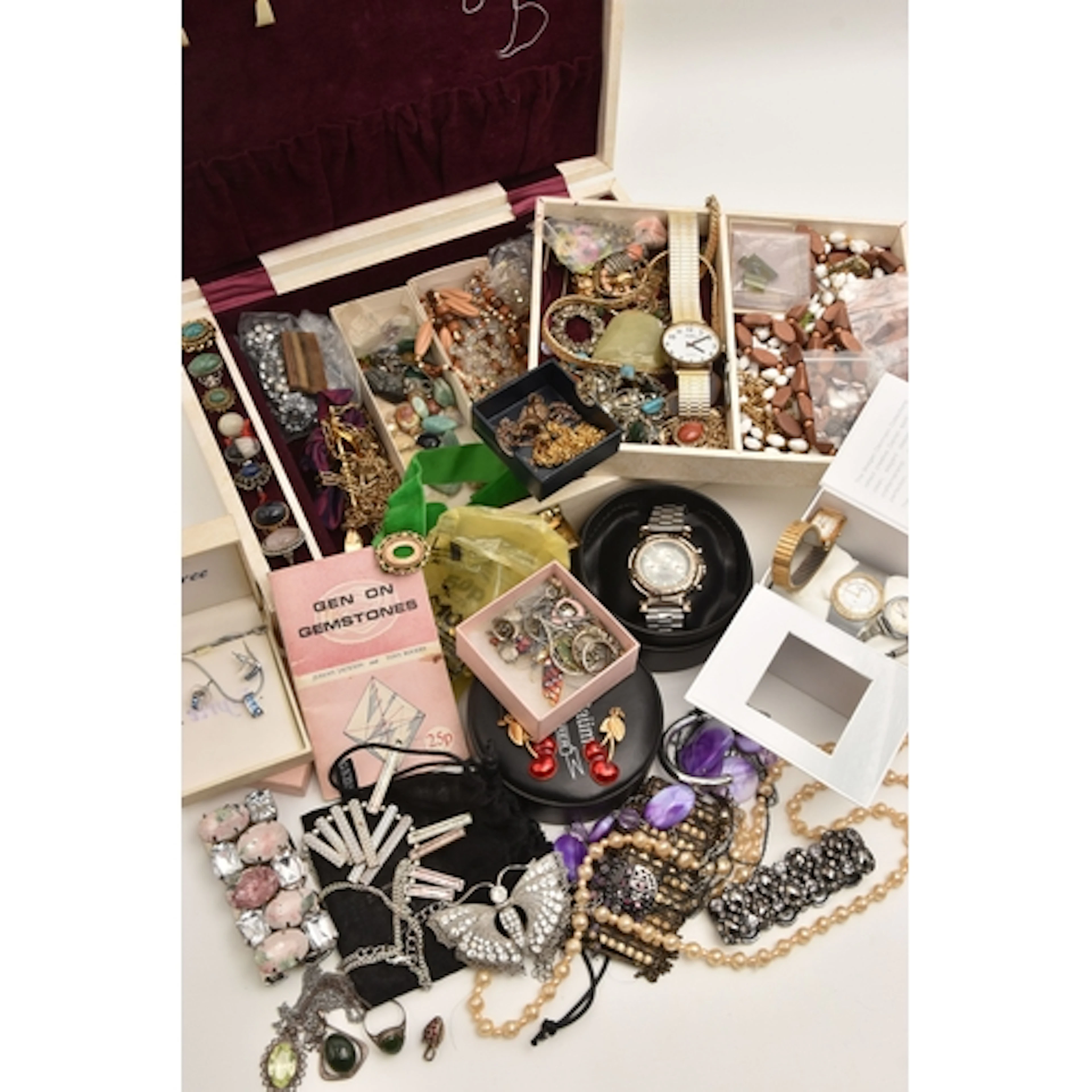 A BOX OF ASSORTED ITEMS, to include a silver gilt strawberry...