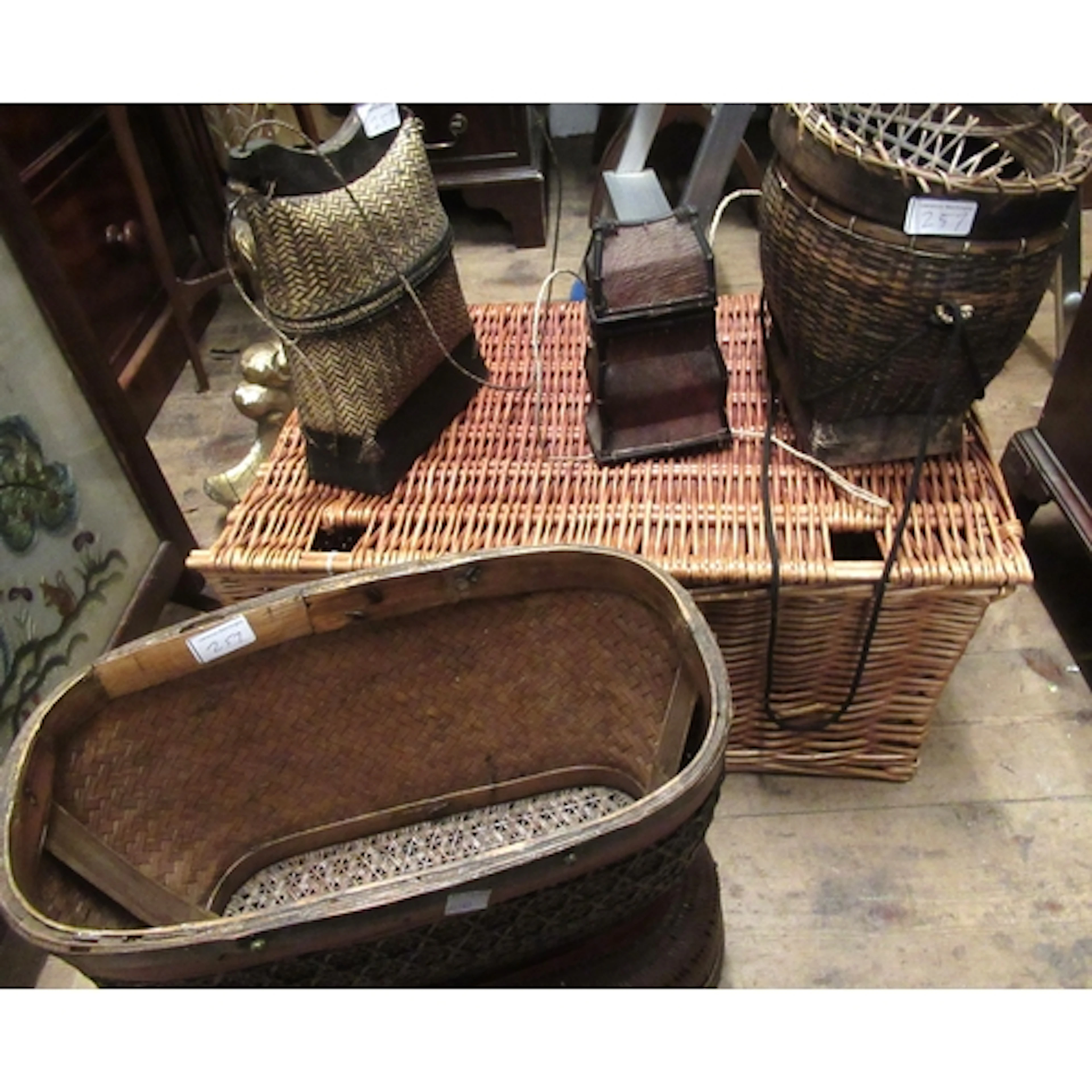 Wicker hamper, together with a quantity of other woven baske...