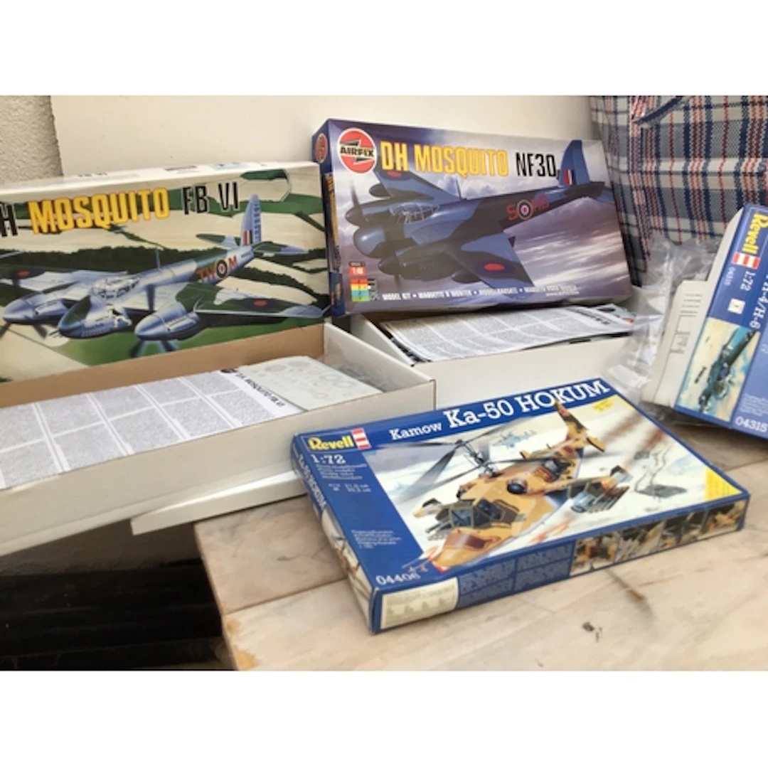 A Collection of boxed model kits featuring aircraft in varie...