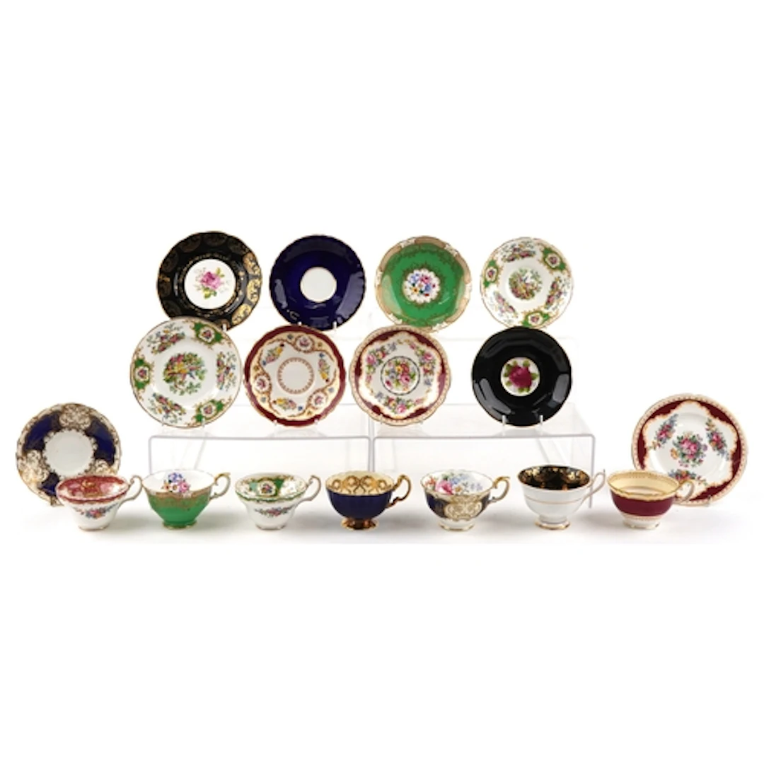 Collection of porcelain cabinet cups and saucers including S...