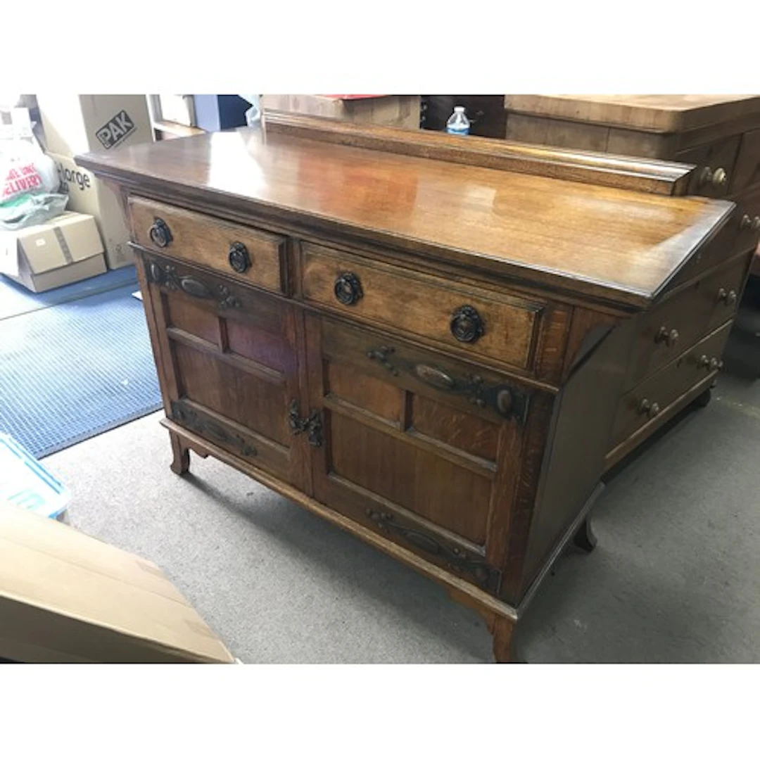 An Arts and Crafts sideboard 57cm long, 138cm wide, 102cm ta...