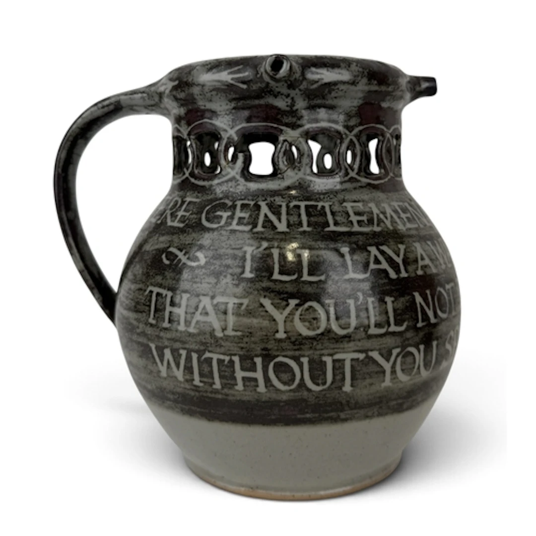 BERNARD LEACH: A CERAMIC PUZZLE JUG The body decorated with ...