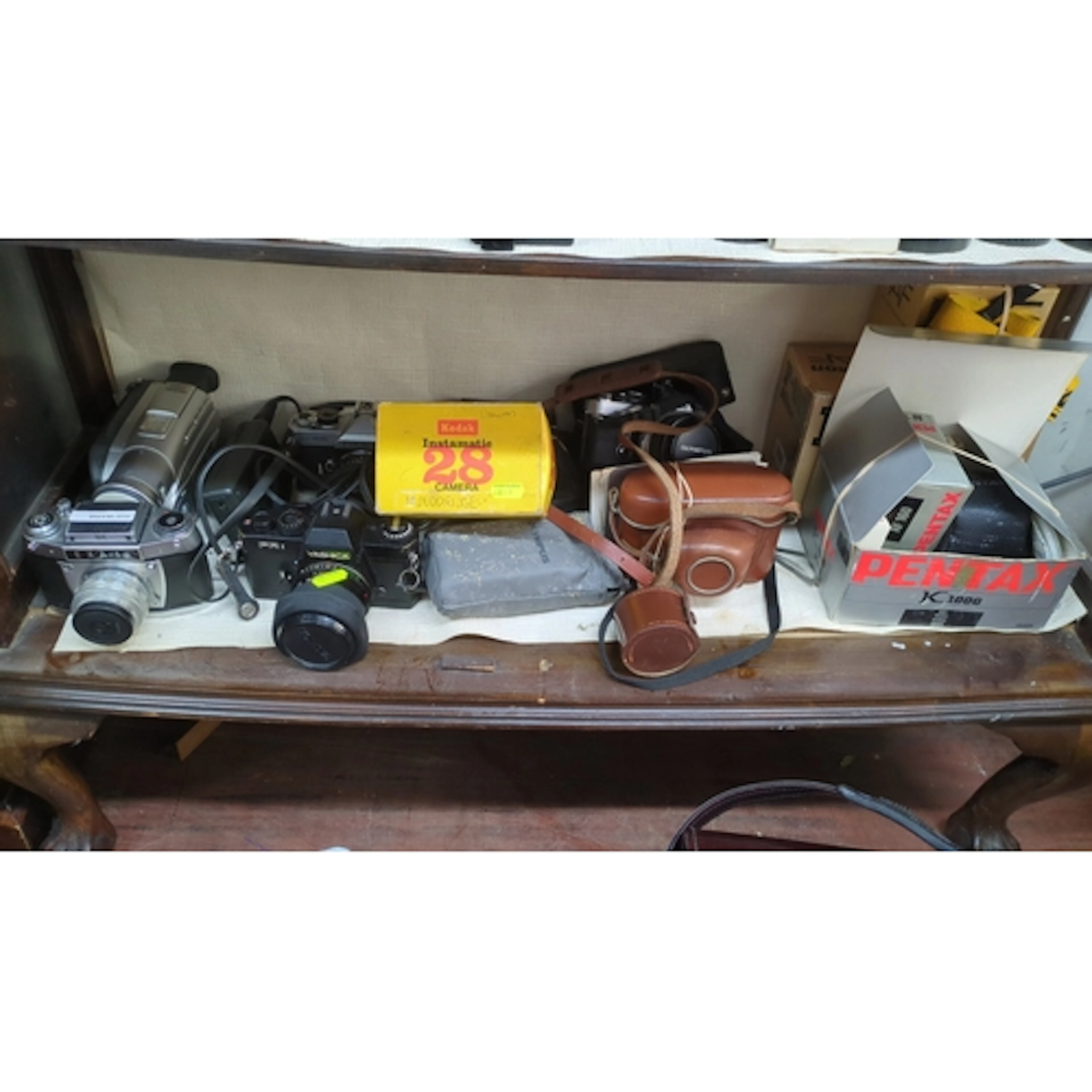 A quantity of vintage cameras and photographic accessories, ...
