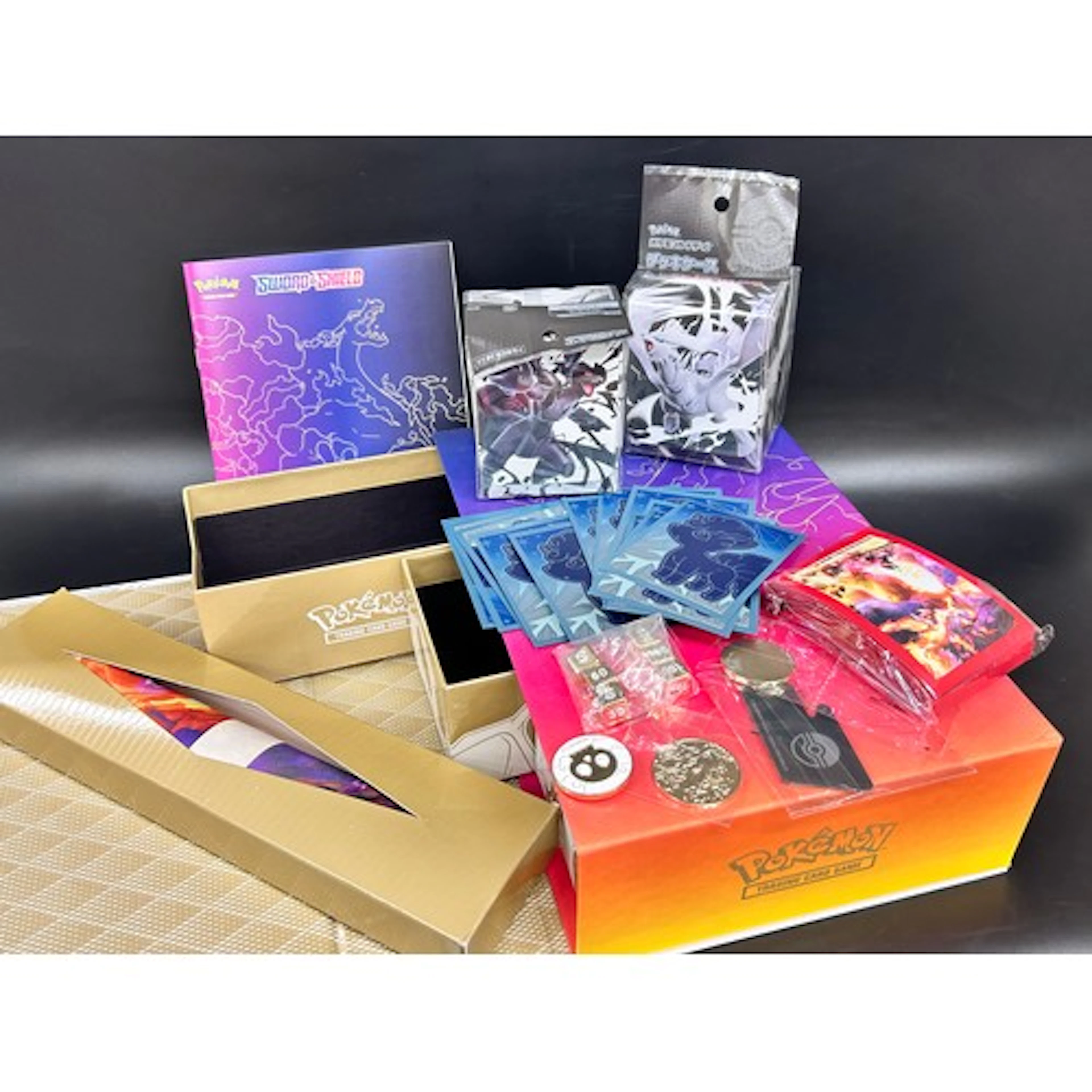 A Pokémon UPC set (no cards), two deck boxes and a poster