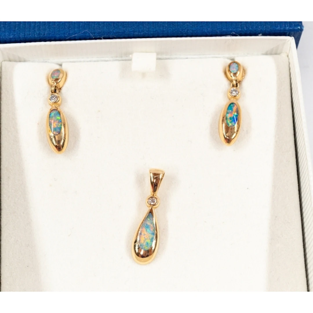 Jewellery: a pair of Kabana 14ct gold diamond and opal drop ...