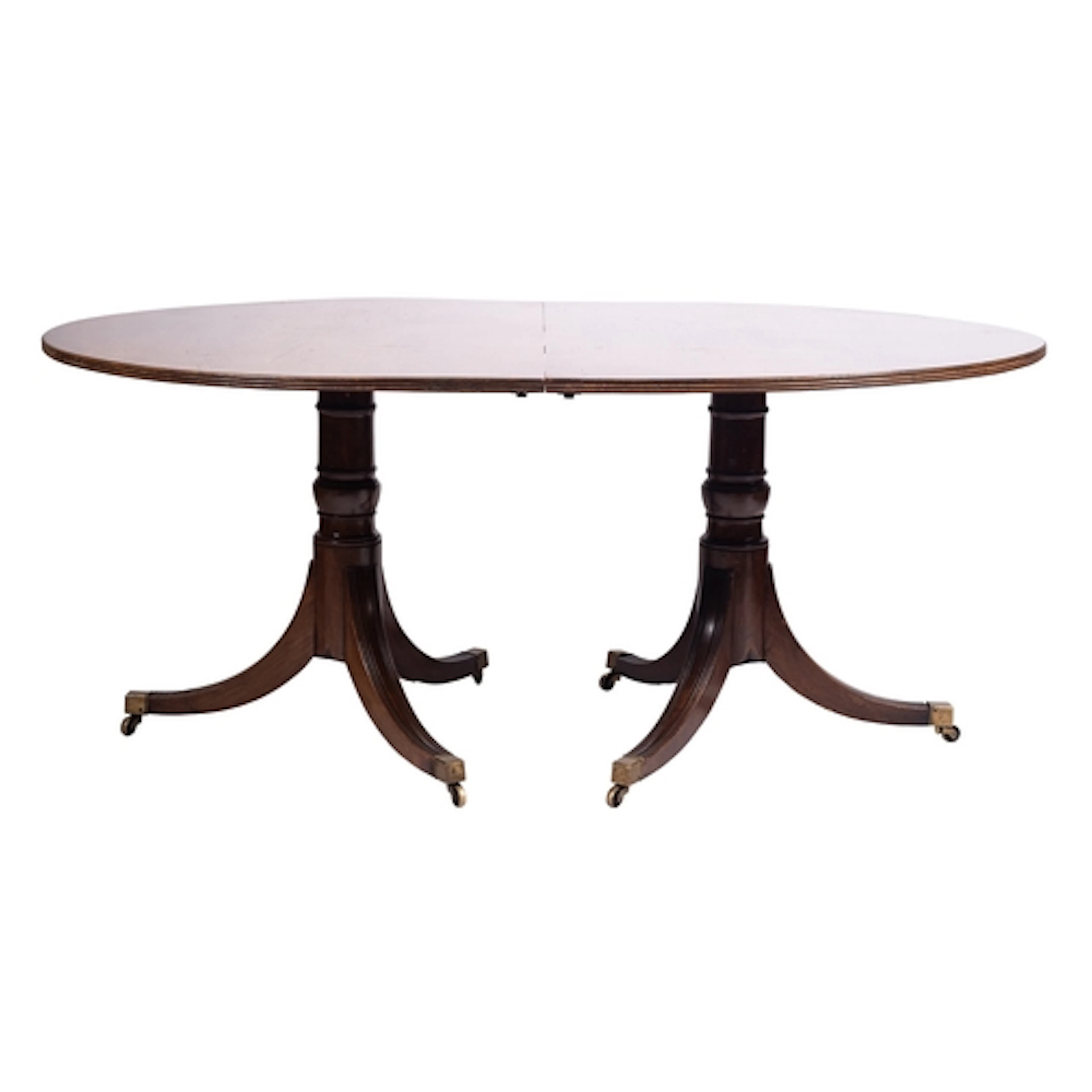 A Regency mahogany twin-pillar dining table, early 19th cent...