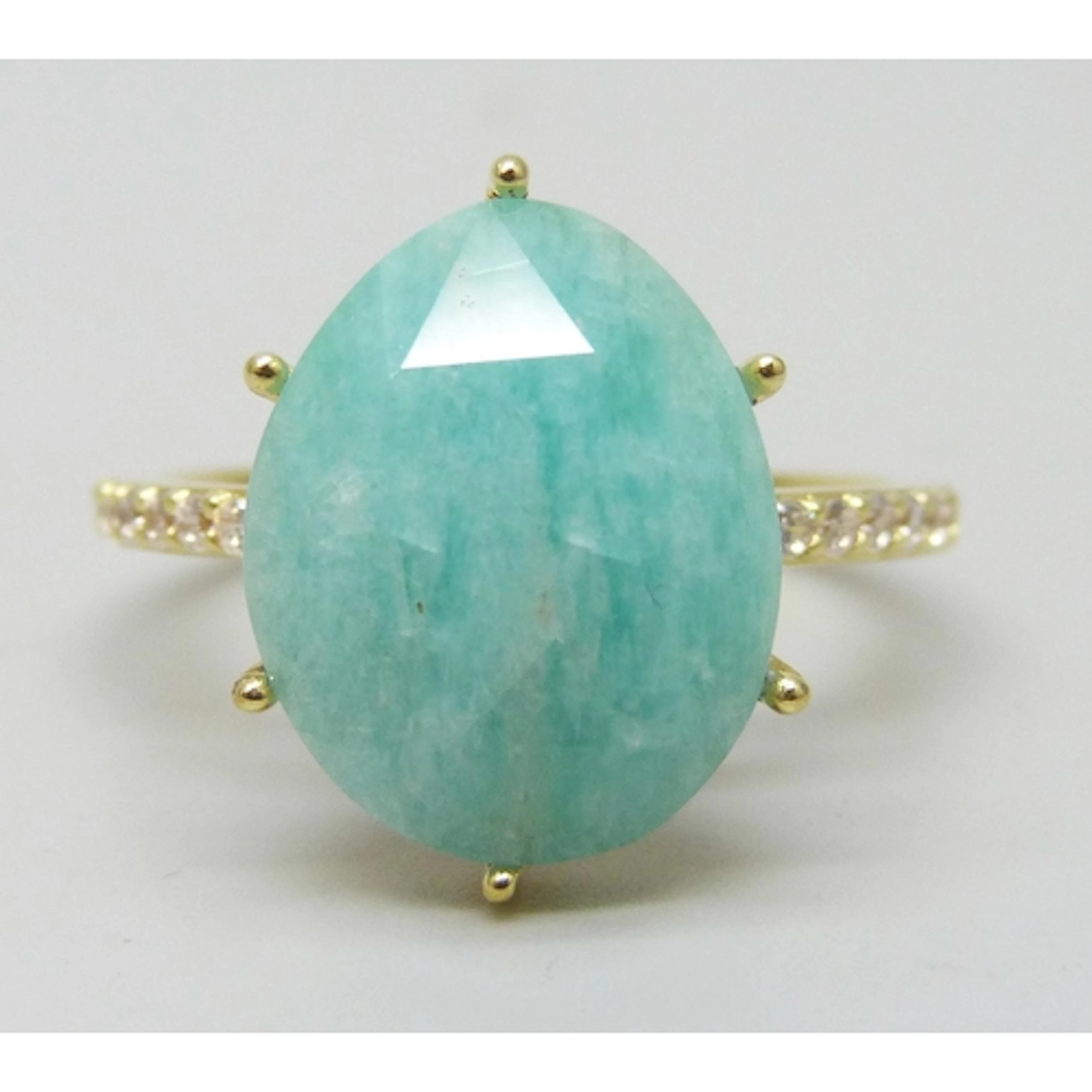 A silver gilt ring set with a faceted amazonite stone, U