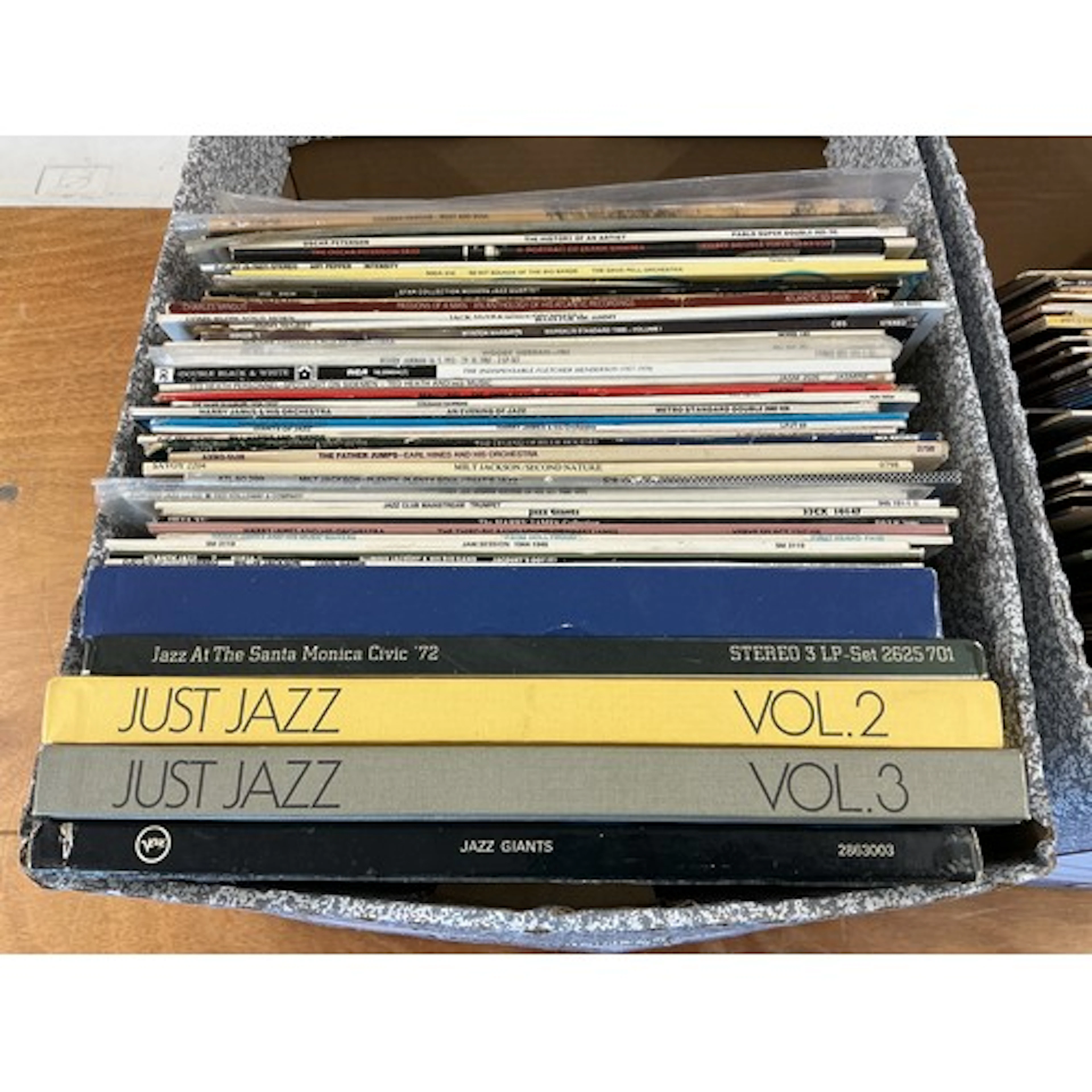 Two boxes of jazz LPs by various artists including Stan Getz...