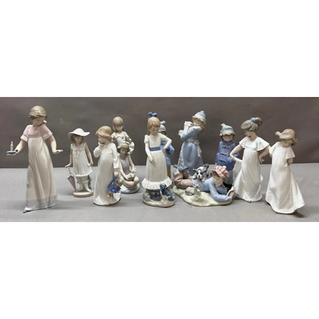 A selection of Lladro and NAO figures. Various styles and po...
