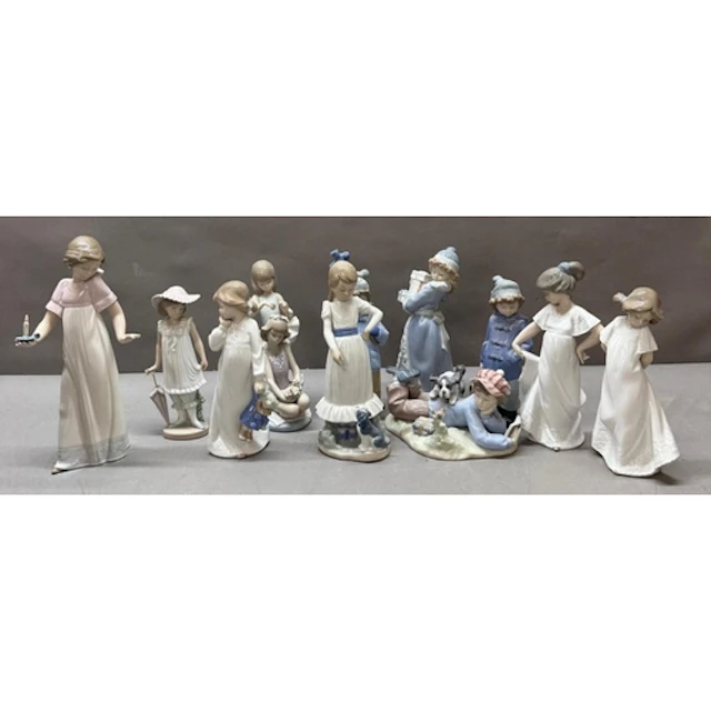 A selection of Lladro and NAO figures. Various styles and po...