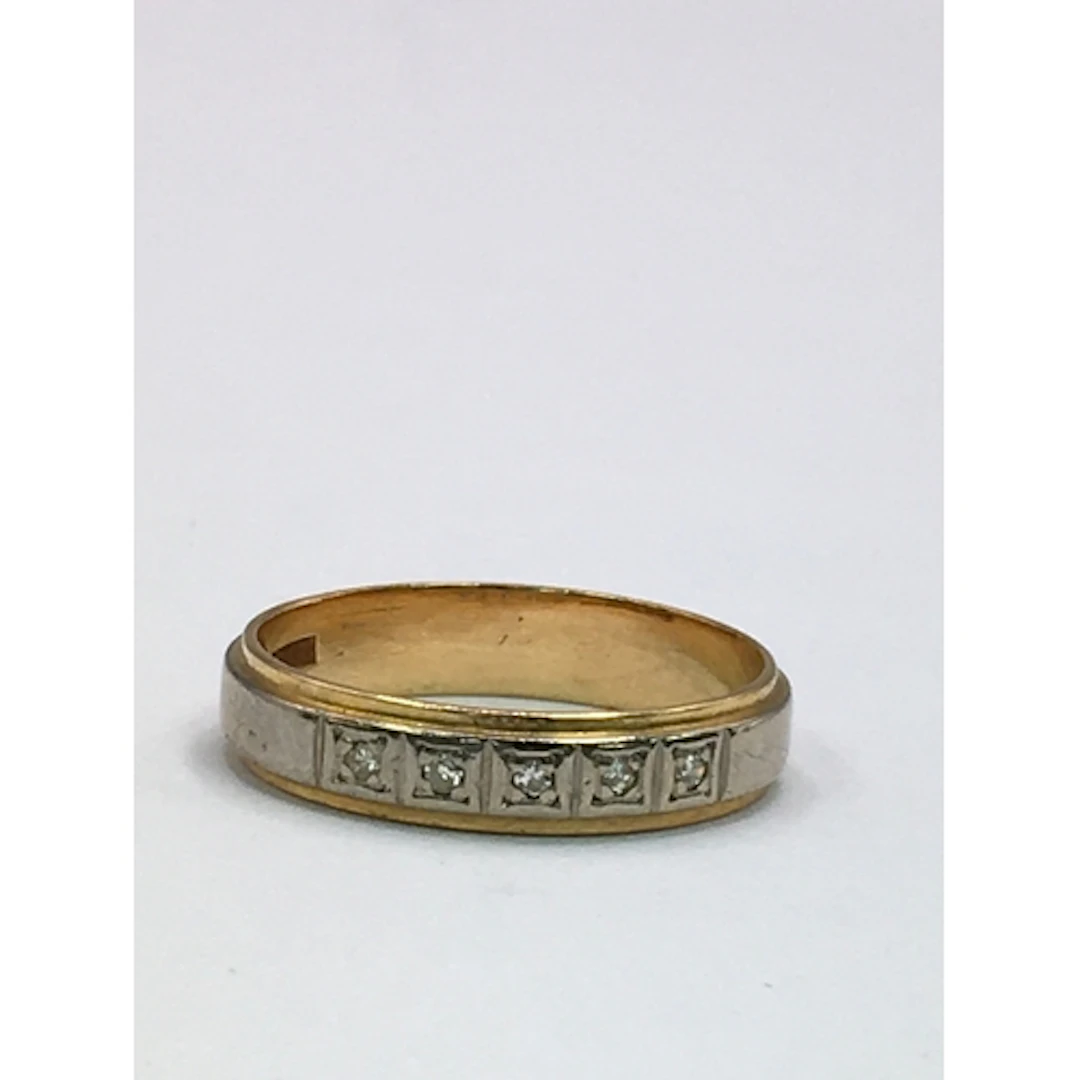 An 18ct gold, two tone wedding band ring set with small whit...