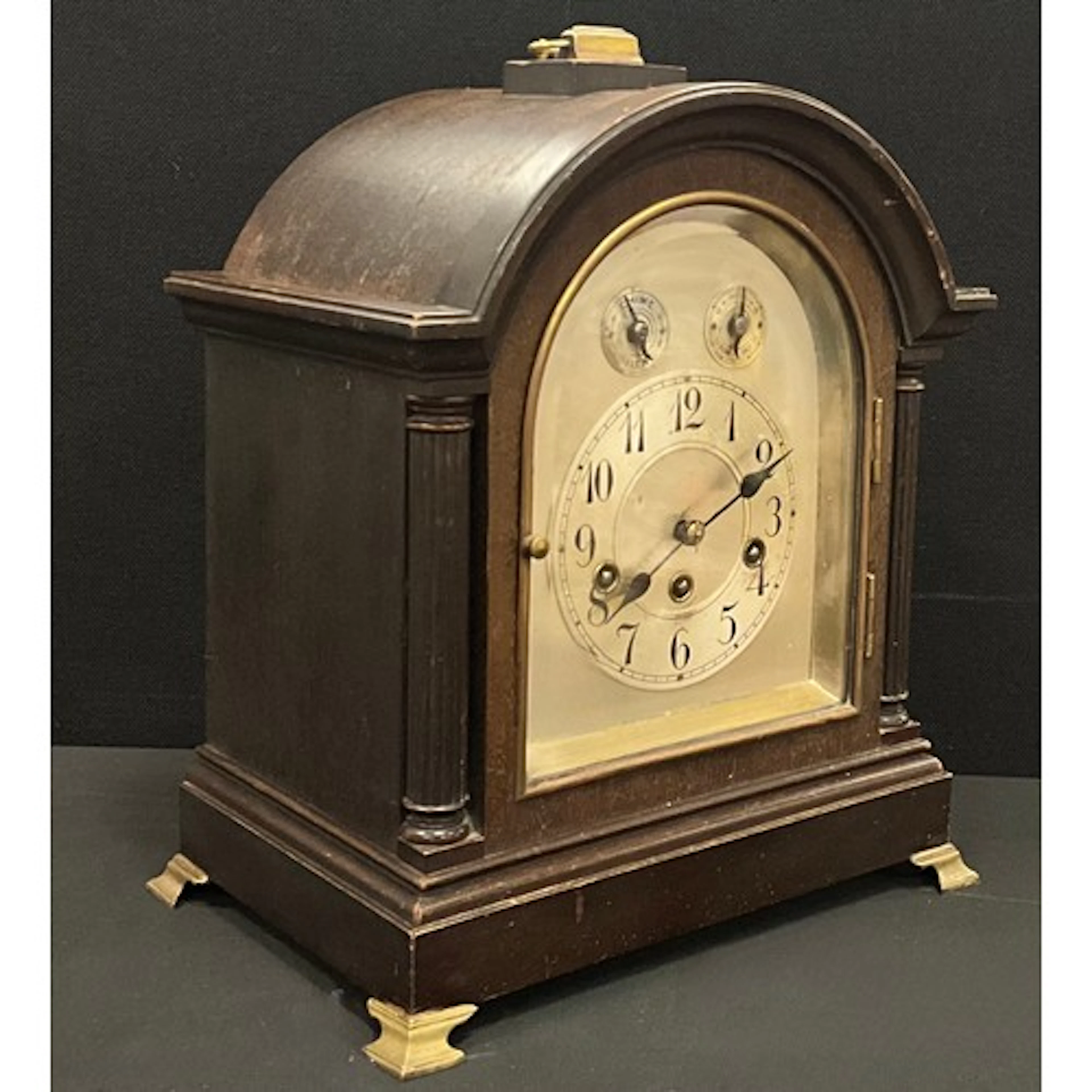 A mid 20th century Junghans mahogany mantel clock, silver ch...