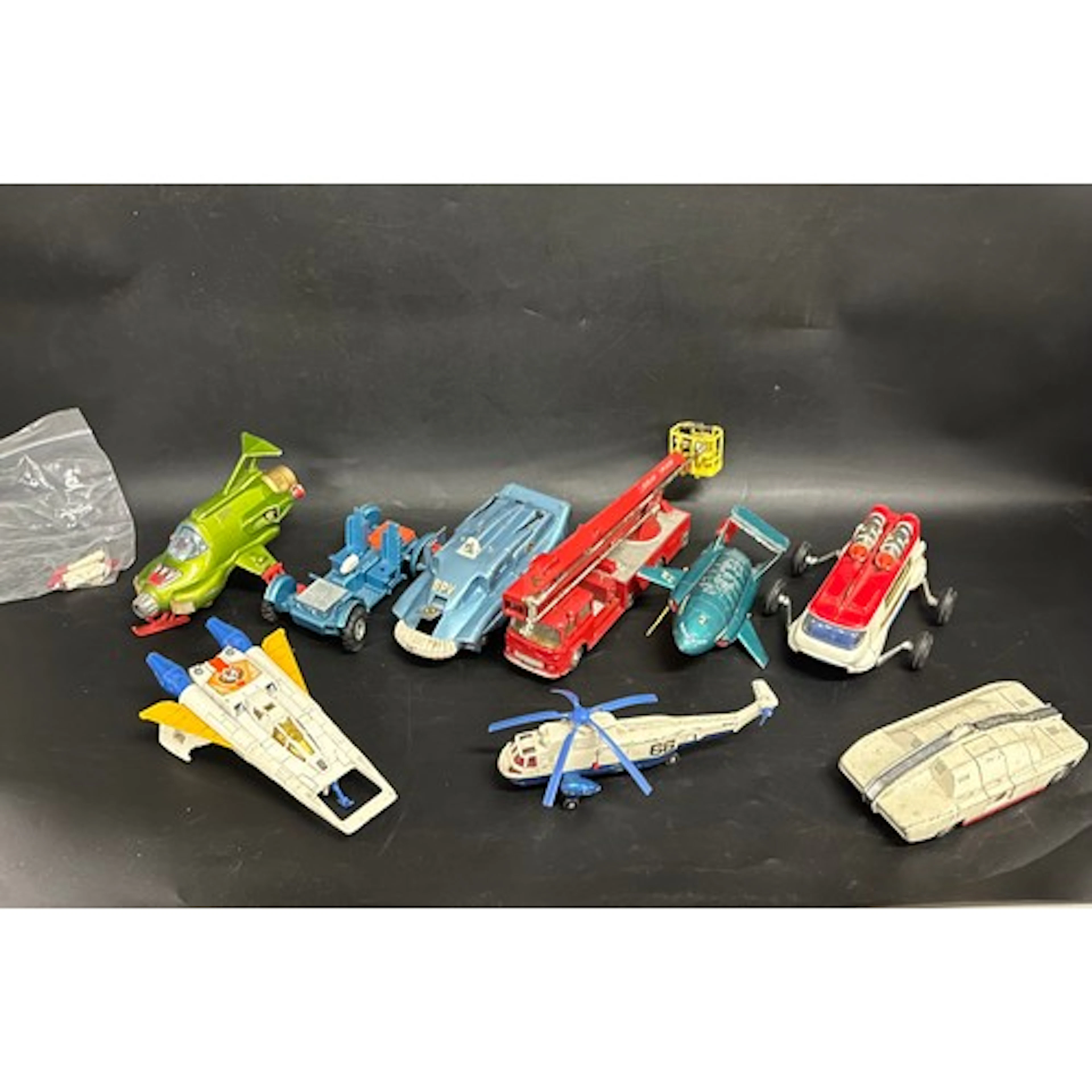A collection of die-cast model vehicles to include Dinky Toy...
