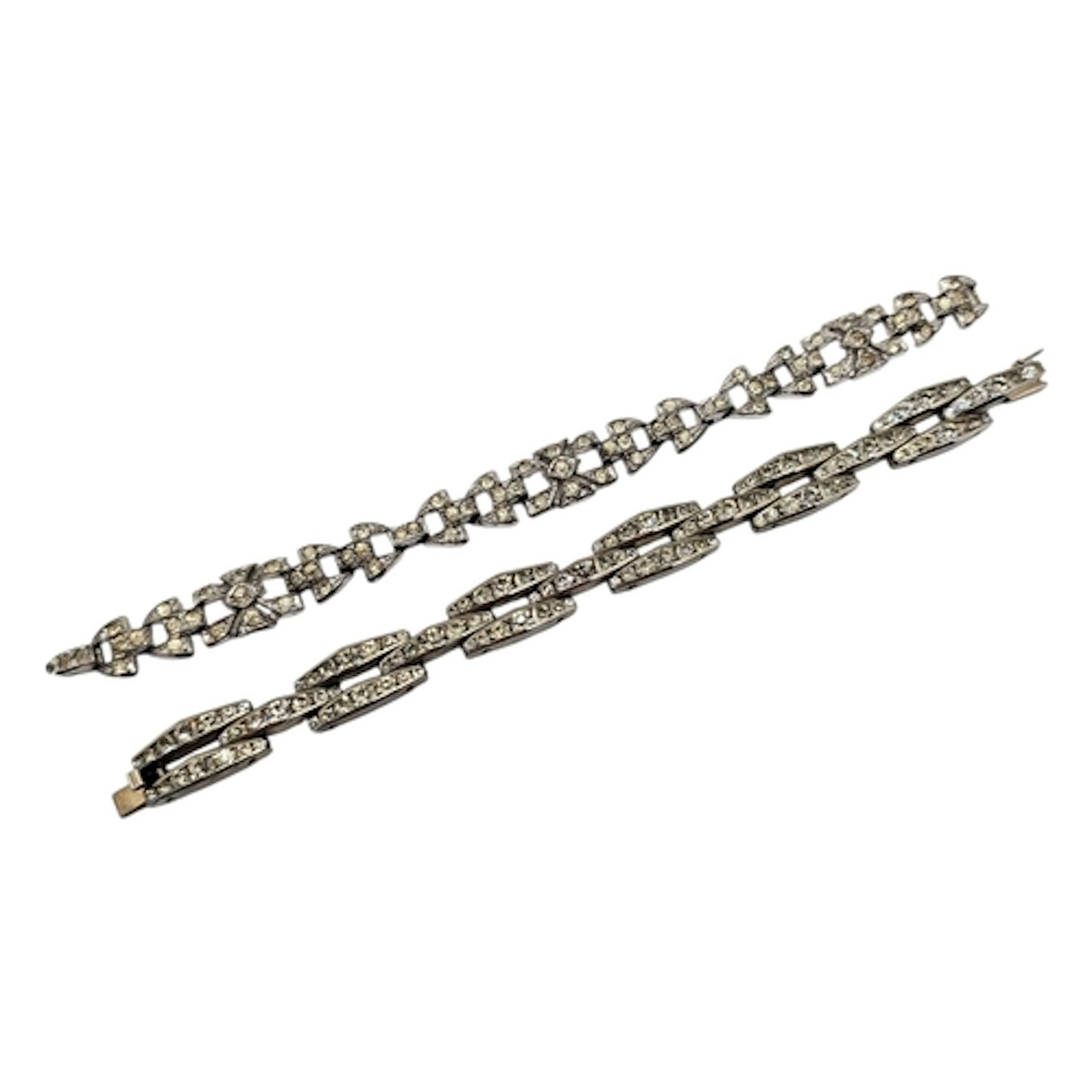 TWO ART DECO WHITE METAL AND DIAMANTÉ BRACELETS To include a...