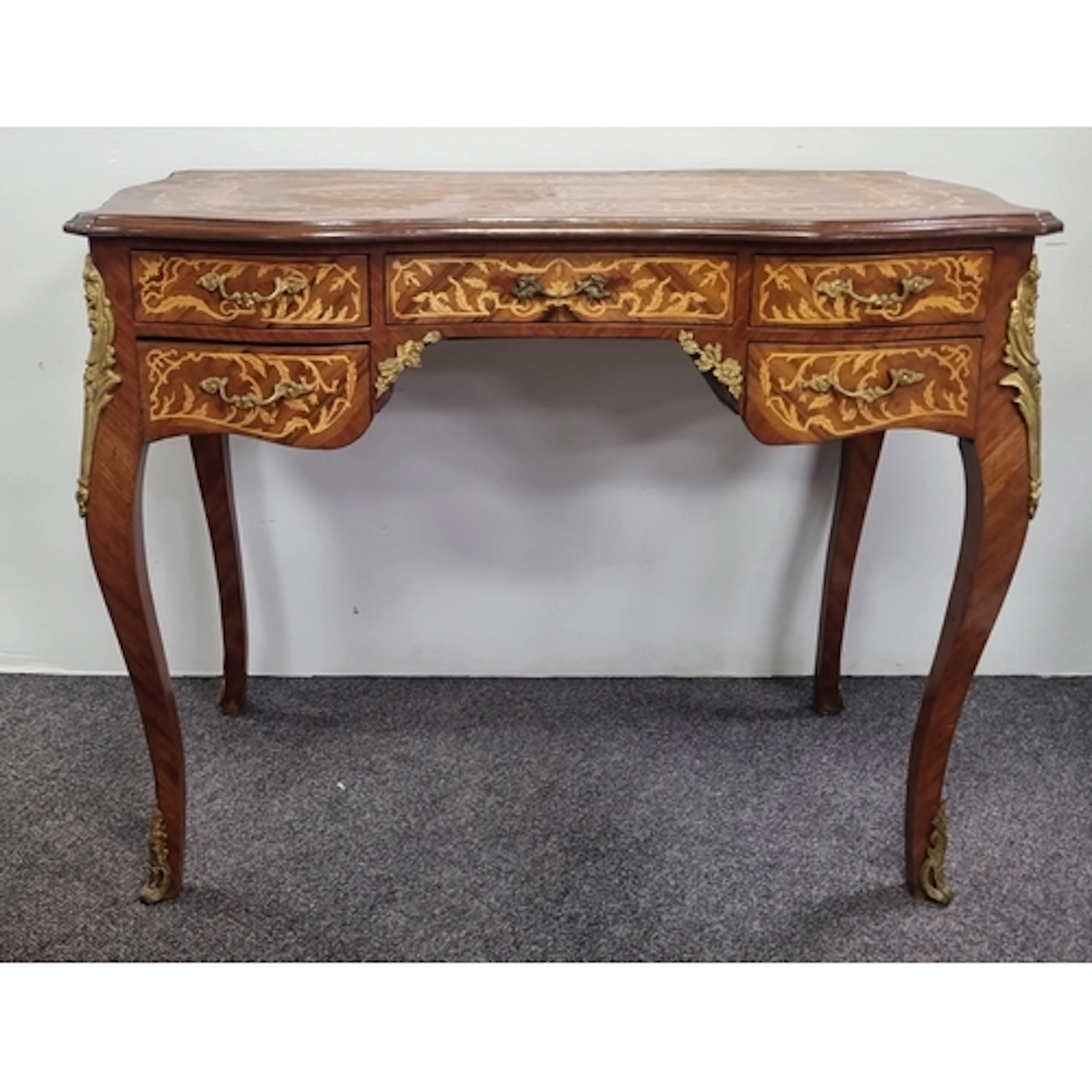 Louis XV-style marquetry writing desk with serpentine top ce...