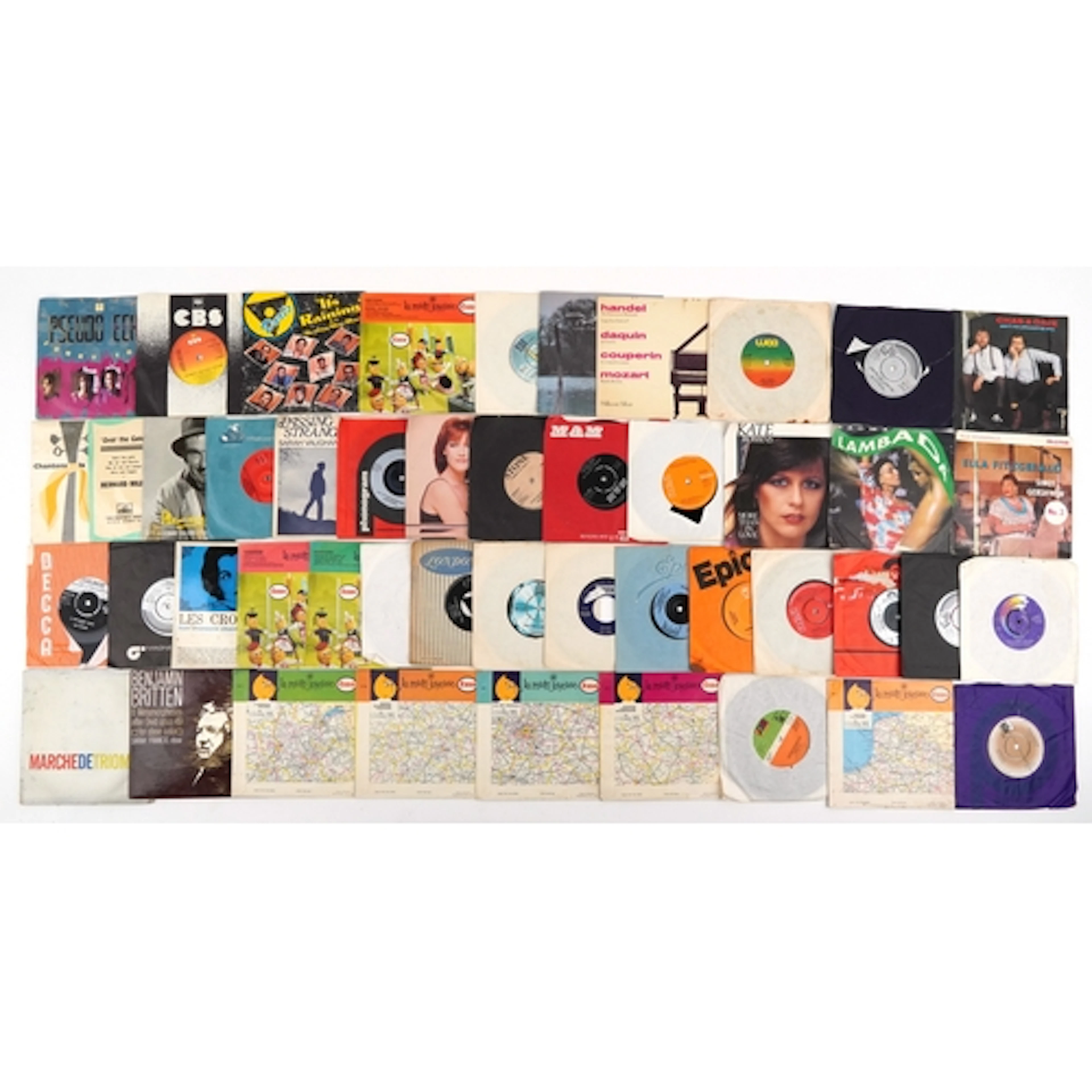 Collection of 45rpm records including Paul Young, Chas. & Da...