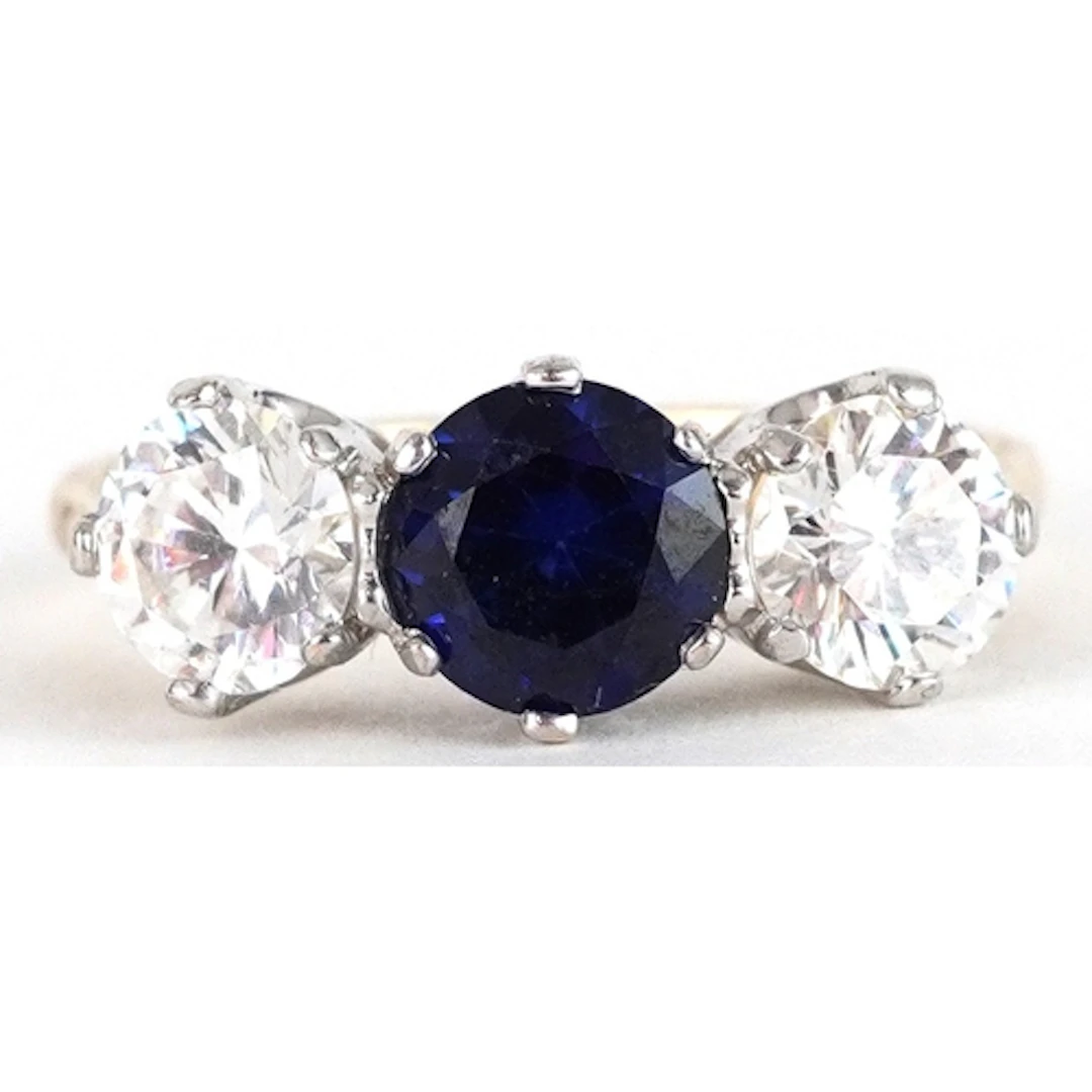 9ct gold blue and clear stone trilogy ring, size M/N, 2.9g.