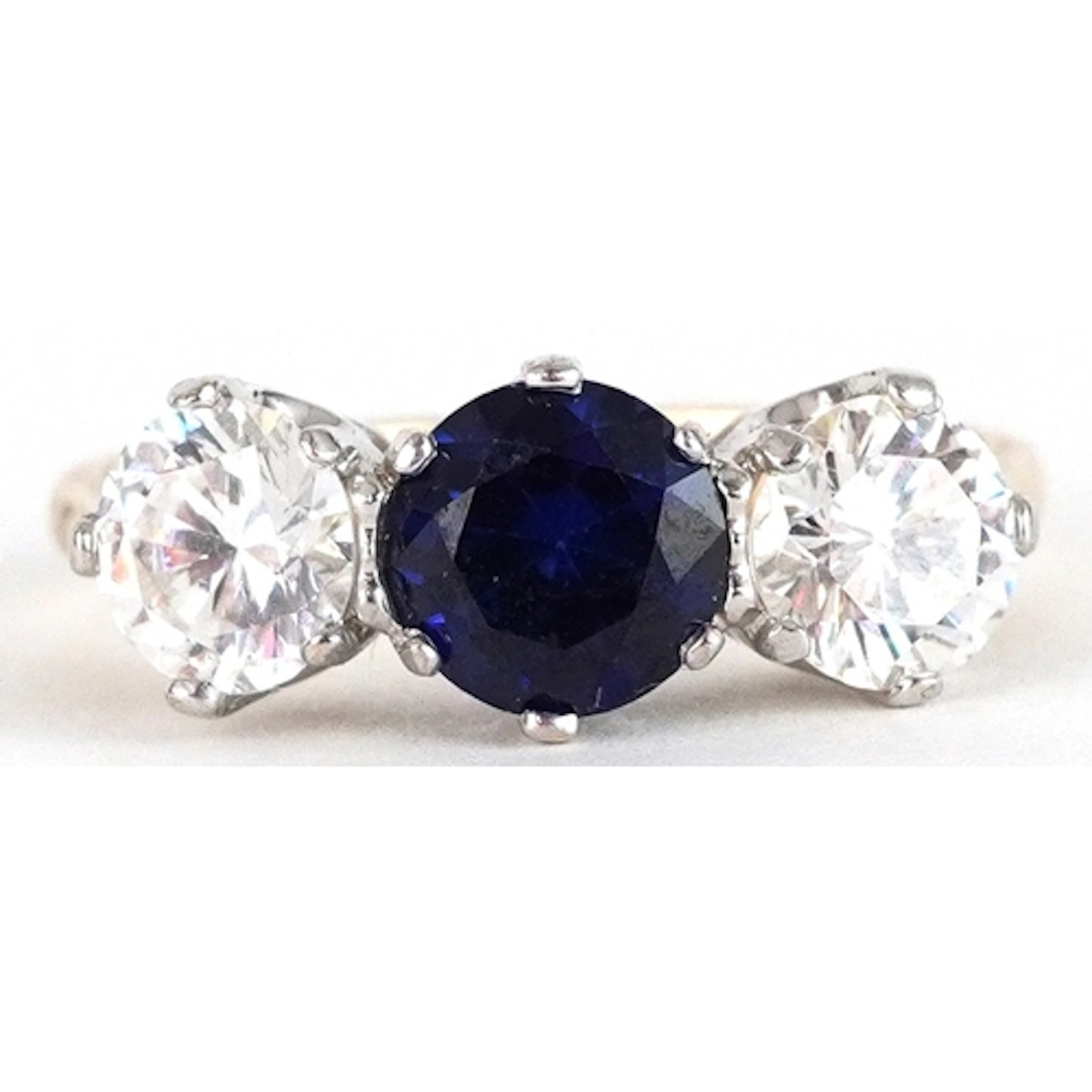 9ct gold blue and clear stone trilogy ring, size M/N, 2.9g.