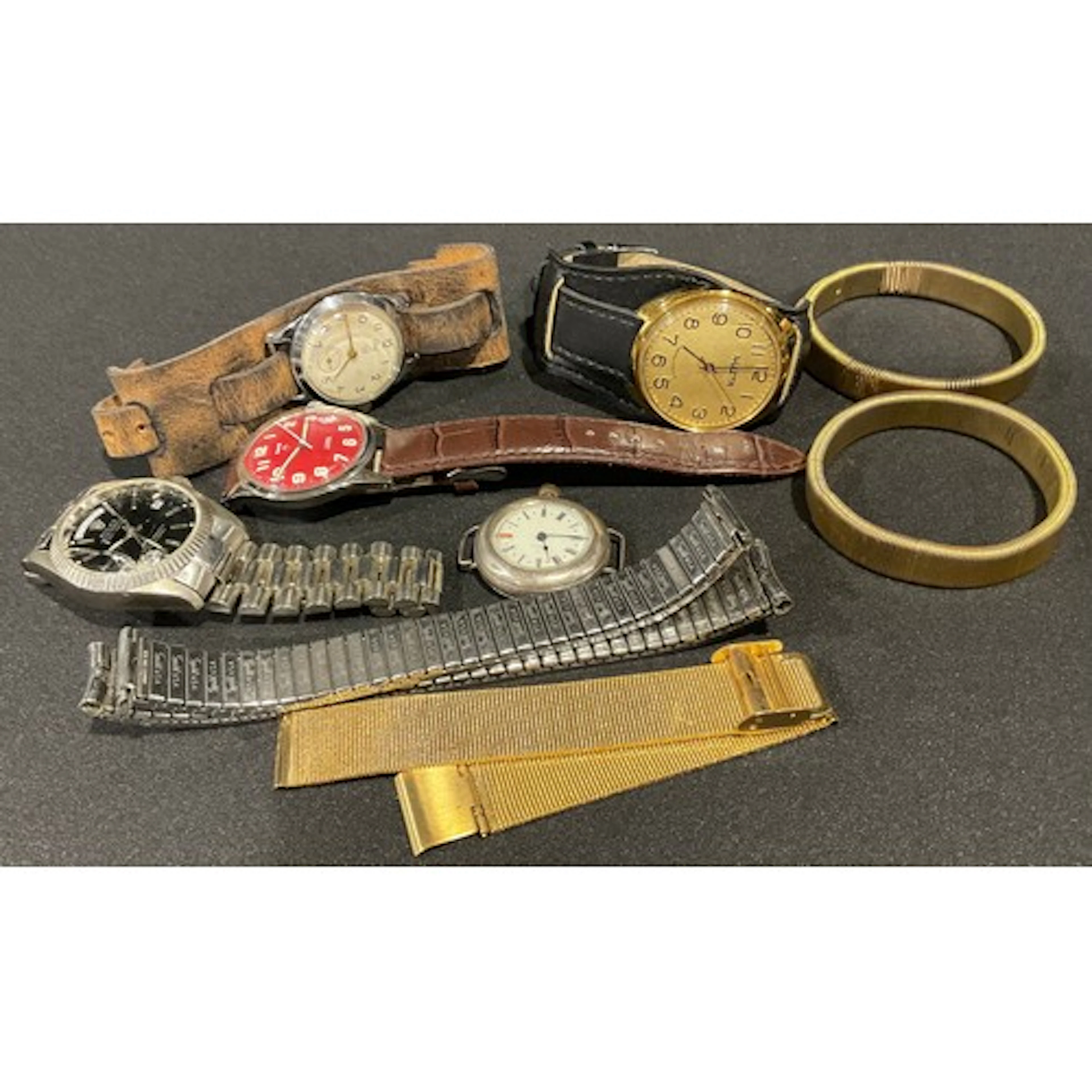 An early 20th century silver trench type watch, Swiss moveme...