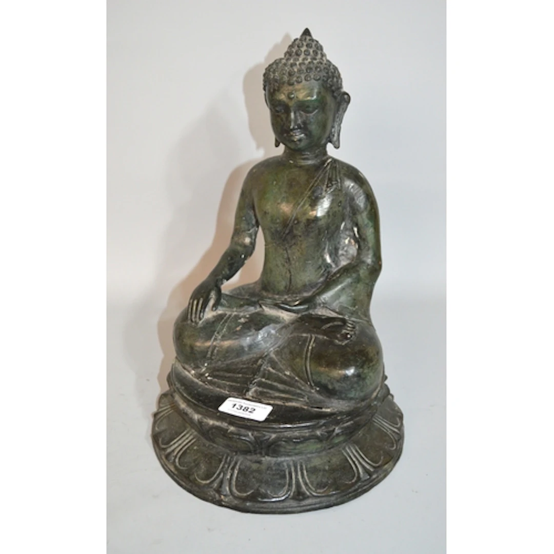 Green patinated metal figure of Buddha, 33cm high