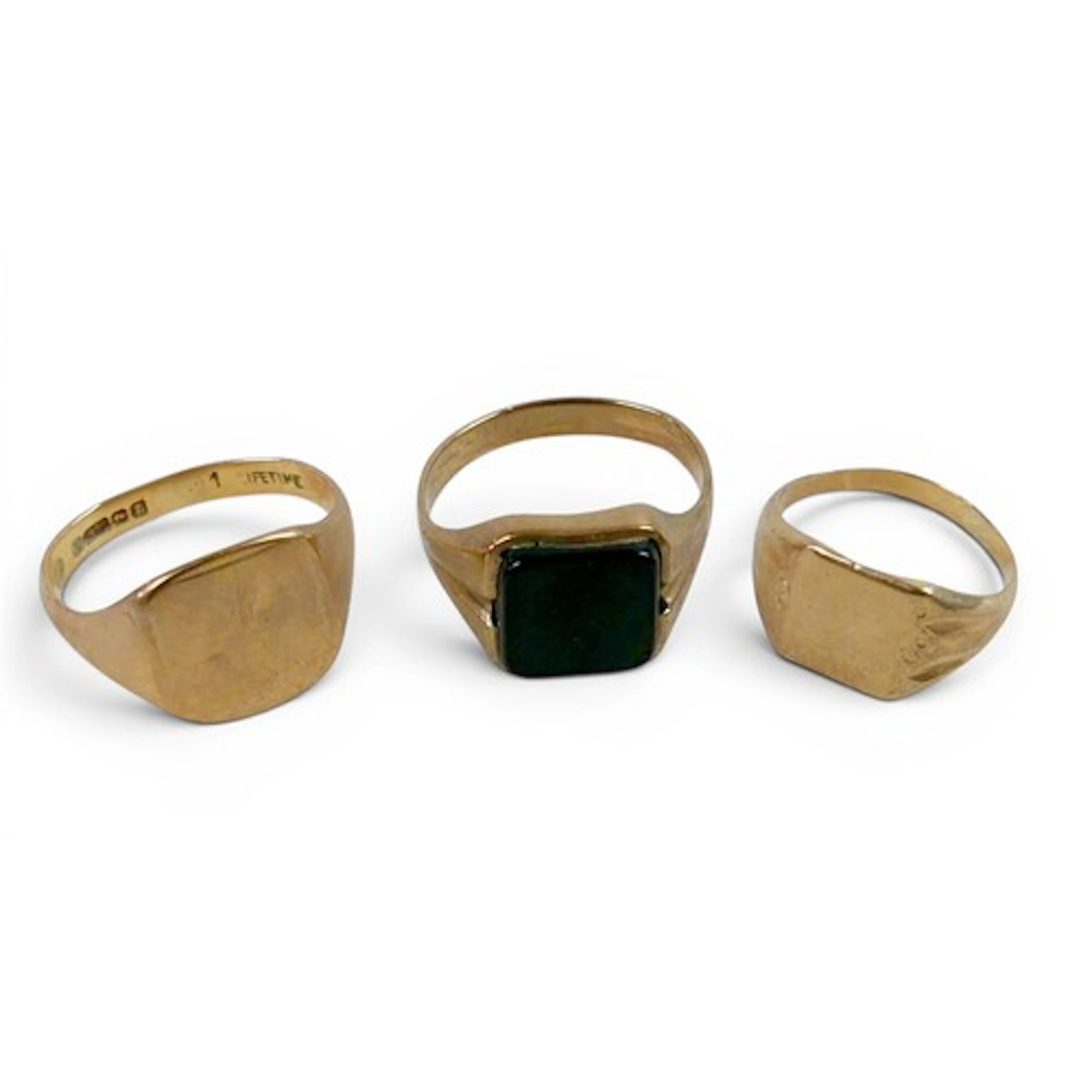 Two 9ct gold gents signet rings, size K with scroll, size N ...