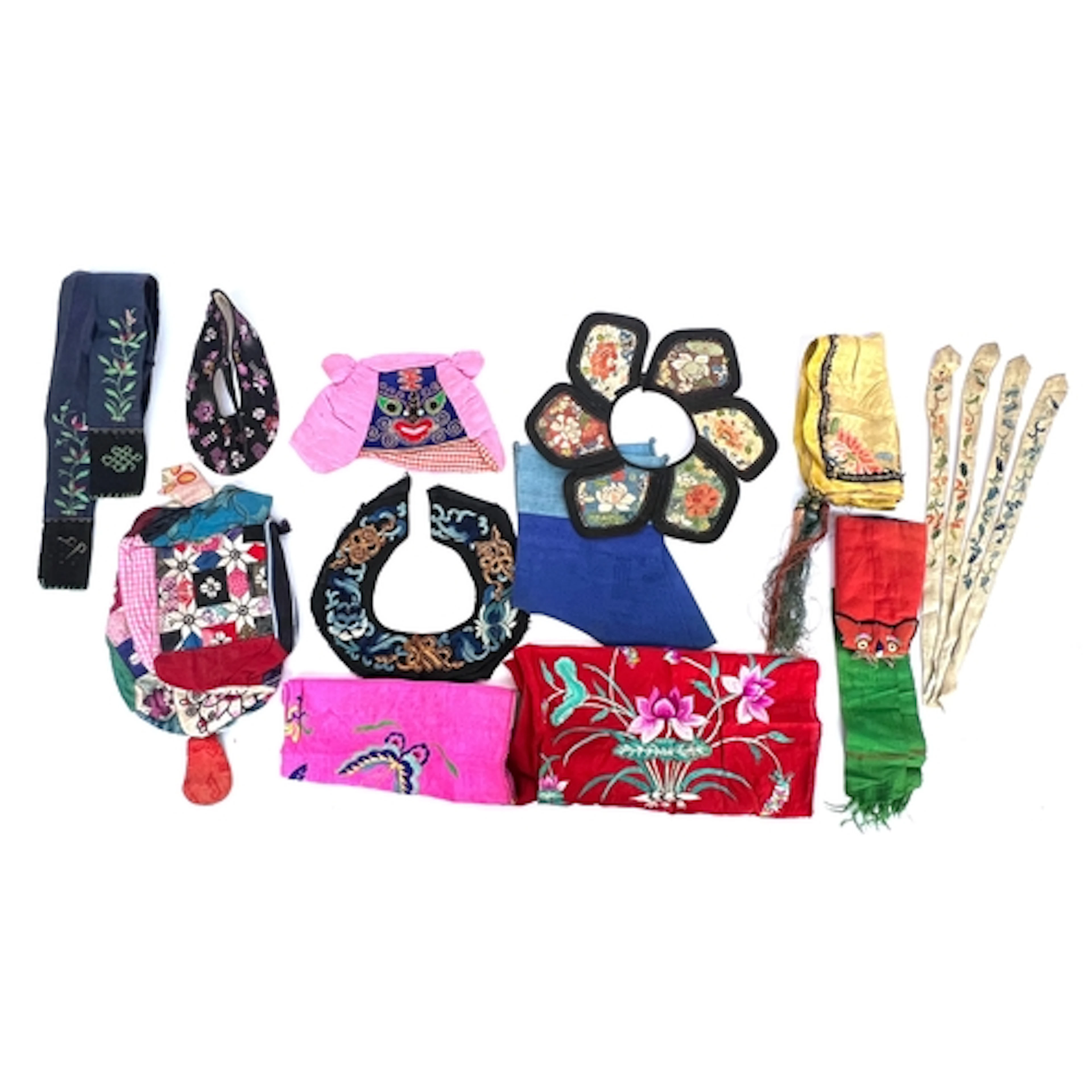 A collection of antique Chinese silk items to include a pink...