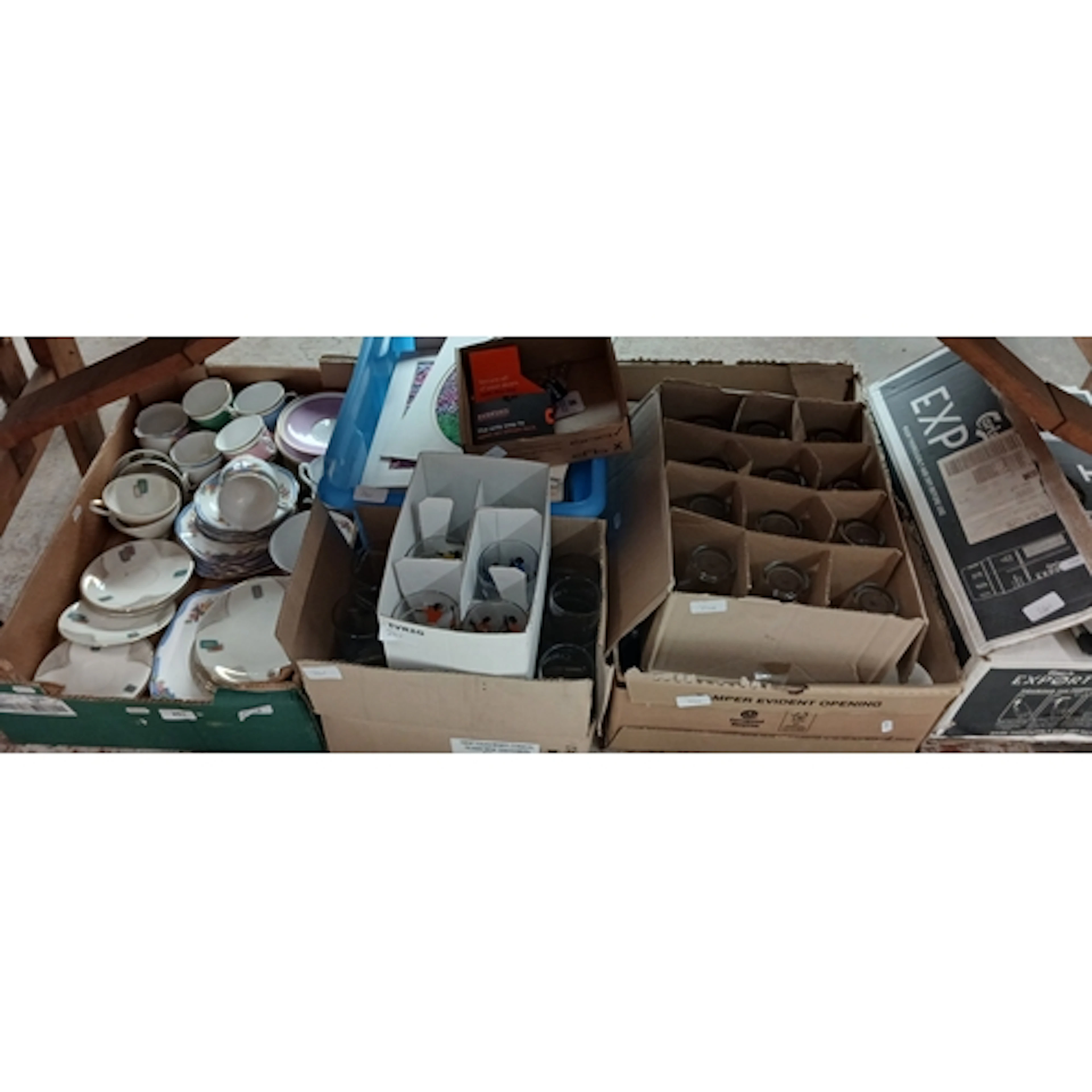 A mixed lot of 8 boxes to include glass ware, ceramic mugs, ...