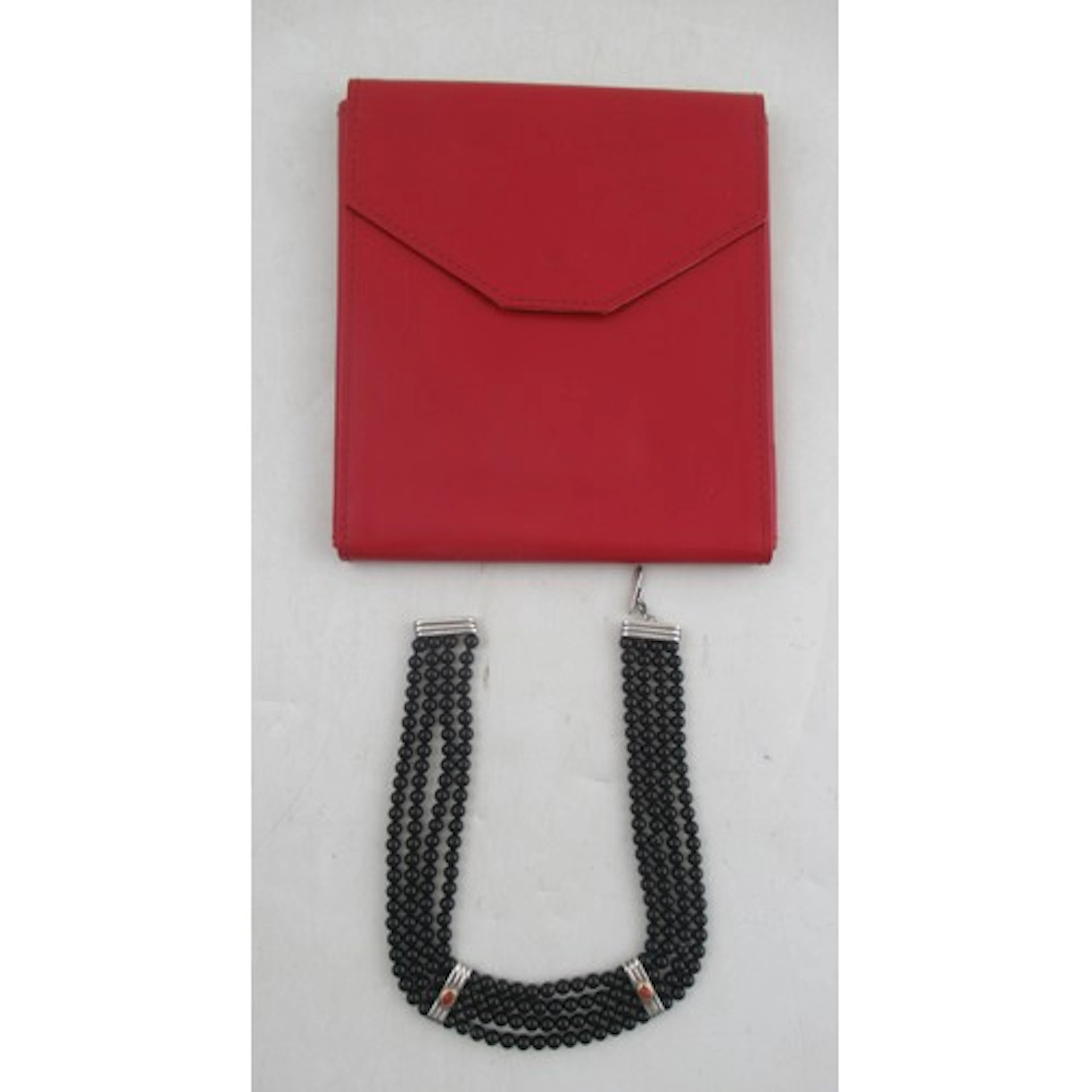 A vintage Cartier necklace, having four strands of black bea...