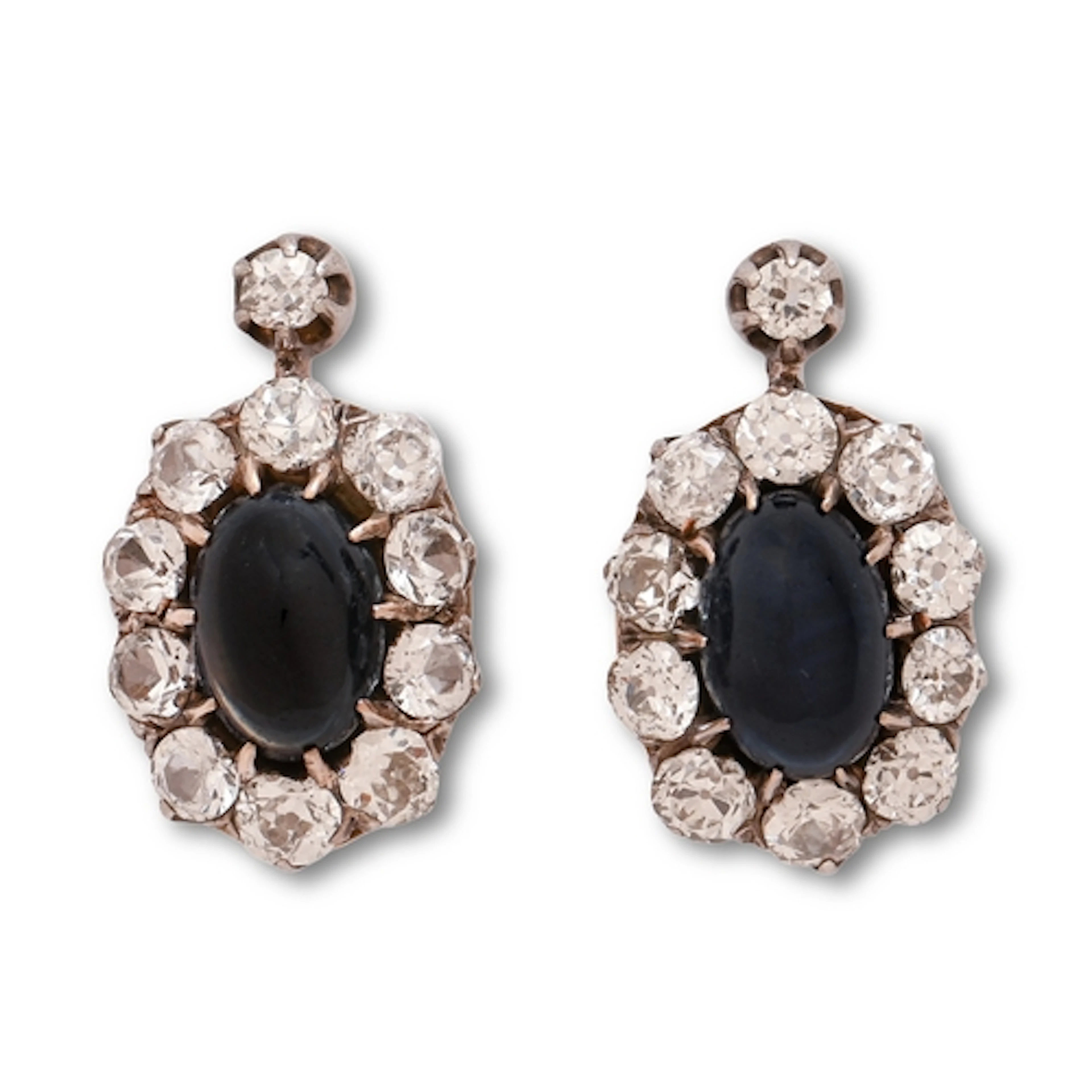 A pair of sapphire and diamond earrings, the larger central ...