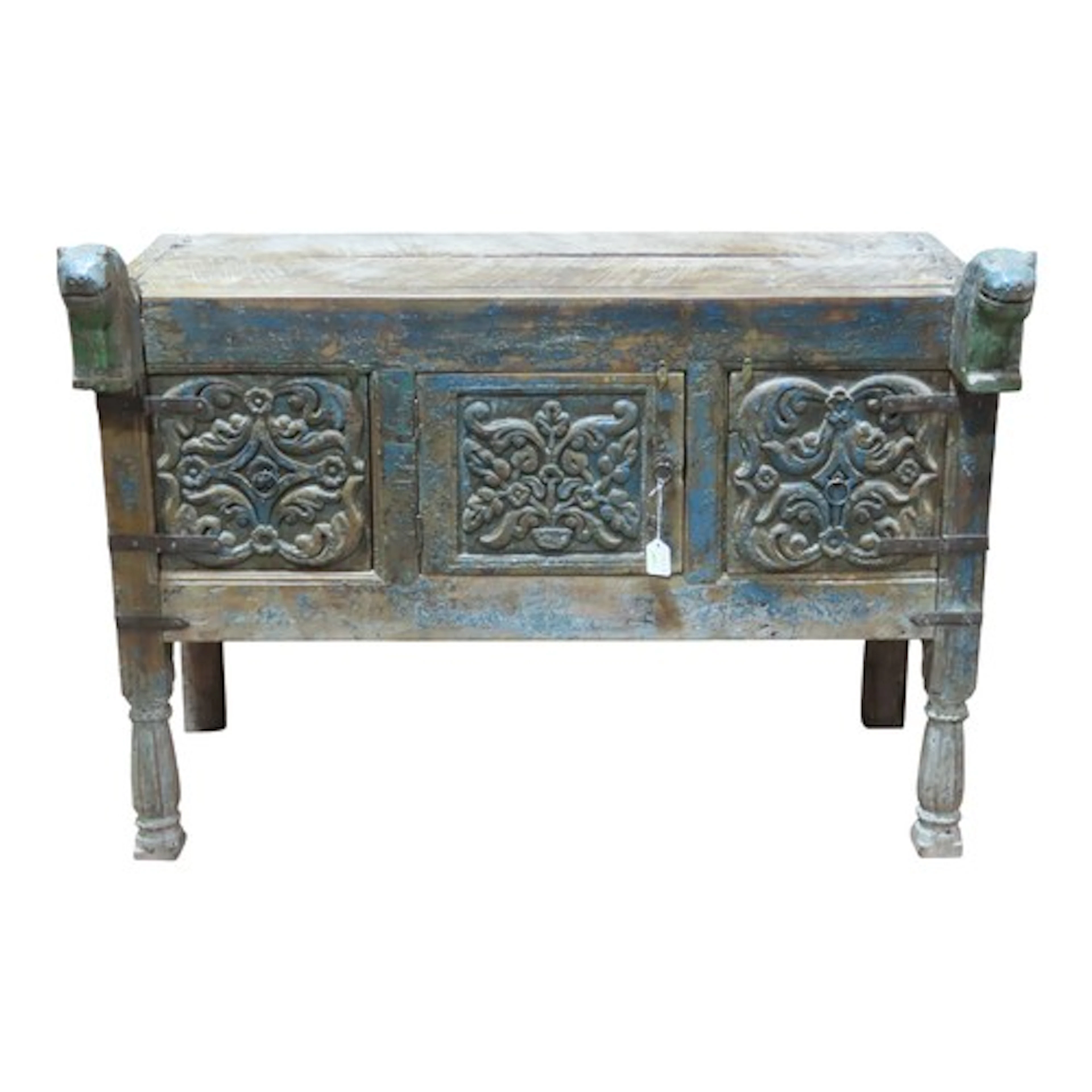 A antique carved Indian Dowry chest enclosed by three carved...