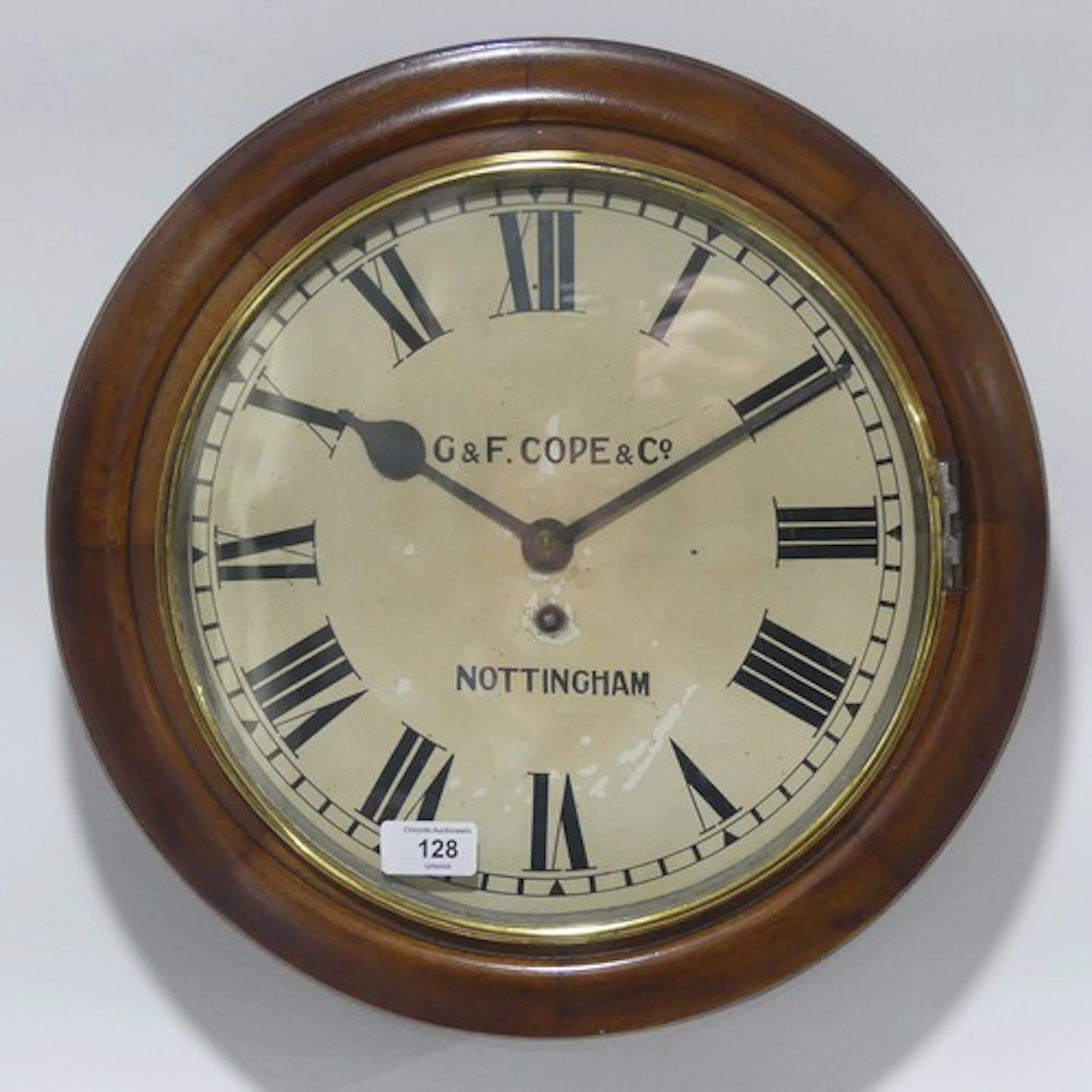 An early 20th century mahogany circular wall Clock, the sing...
