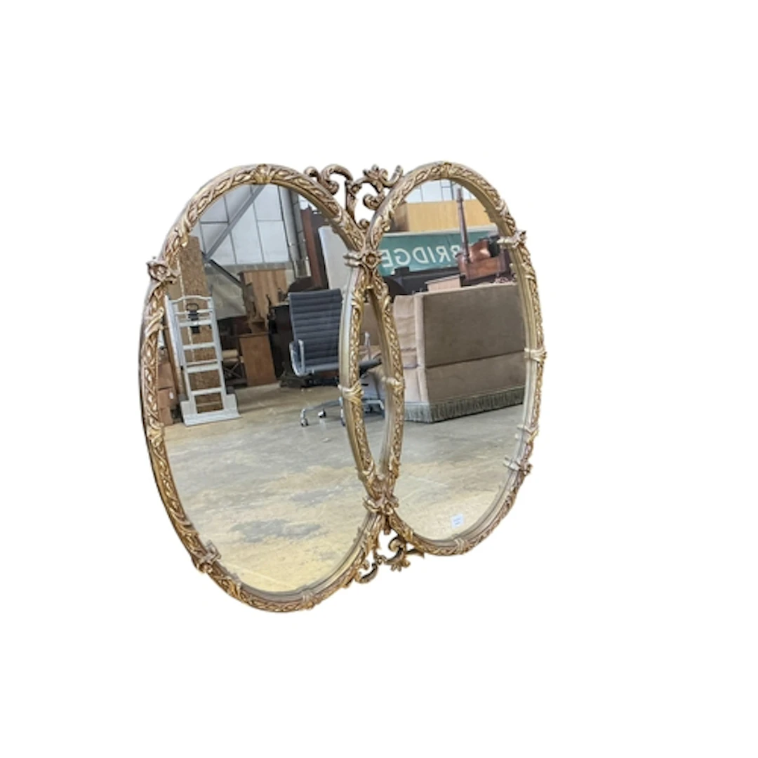 A Regency style double oval giltwood mirror, width 114cm, he...