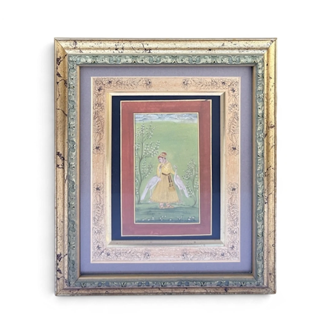 A 19TH CENTURY PAHARI MINIATURE PAINTING DEPICTING A ROBED F...
