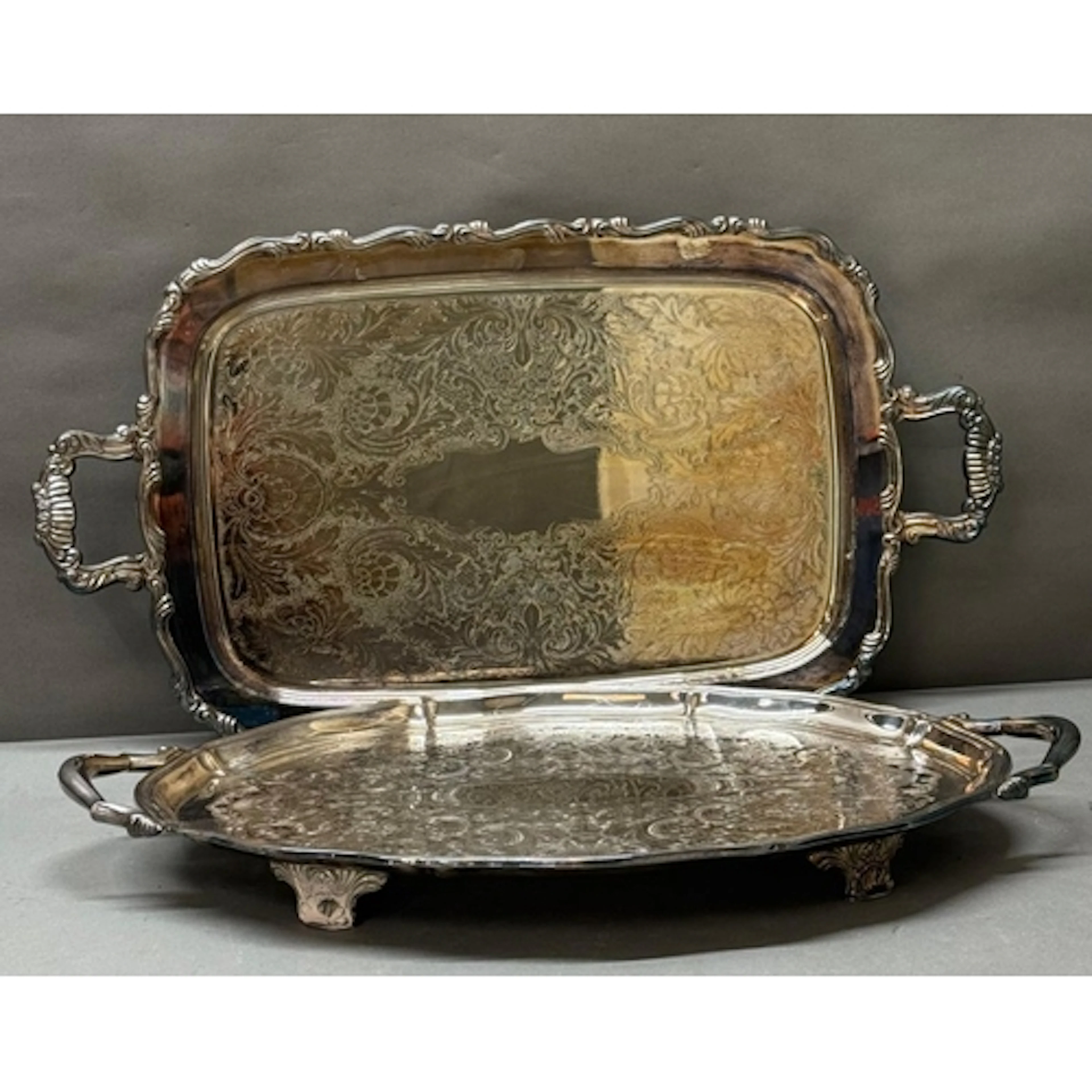 Two large silverplate trays by Oneida