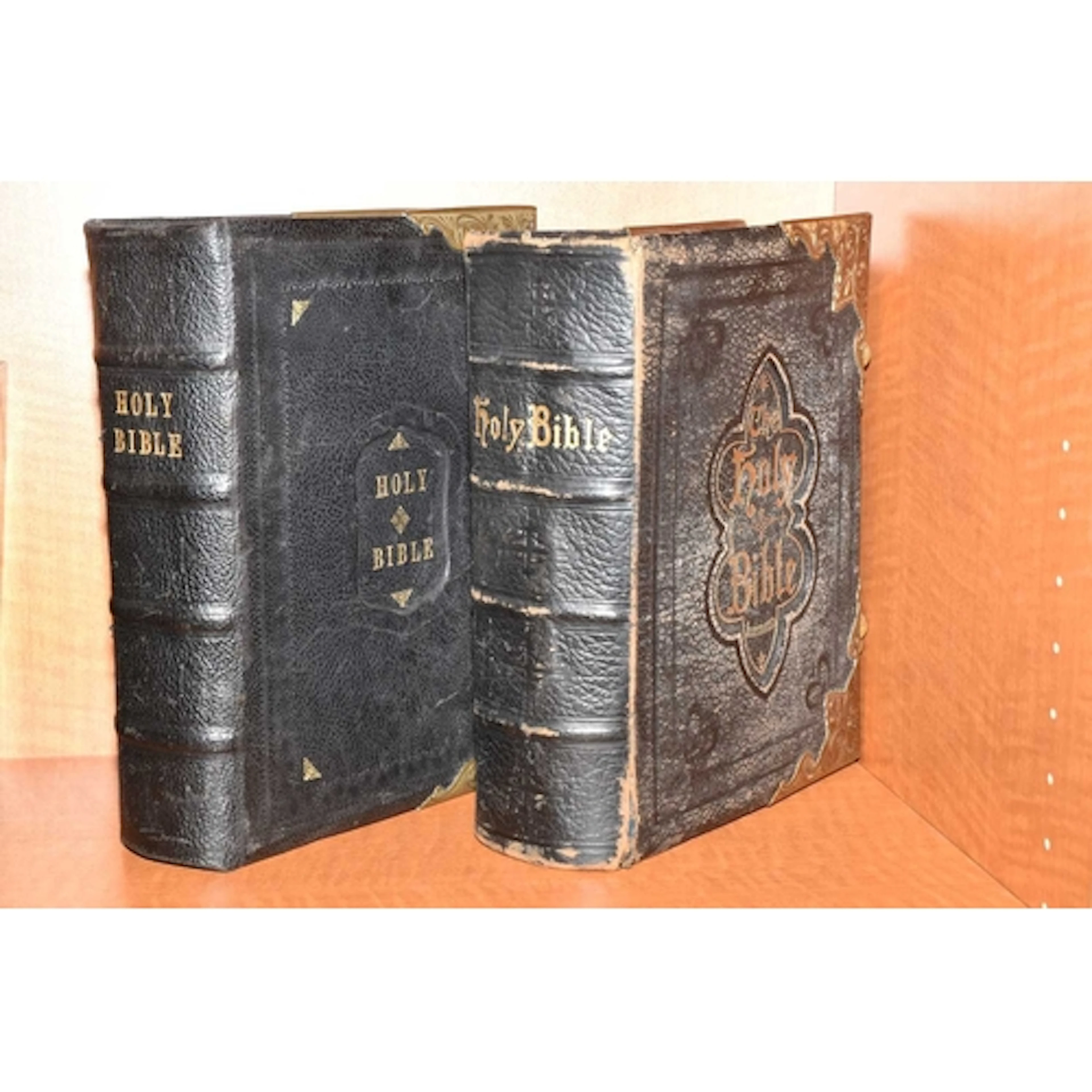 TWO FAMILY BIBLES (19th CENTURY) comprising two 19th century...