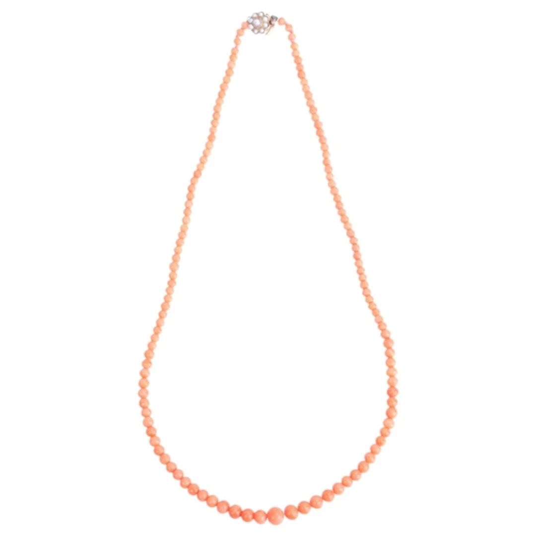 An Antique single-row coral bead necklace, graduated beads m...