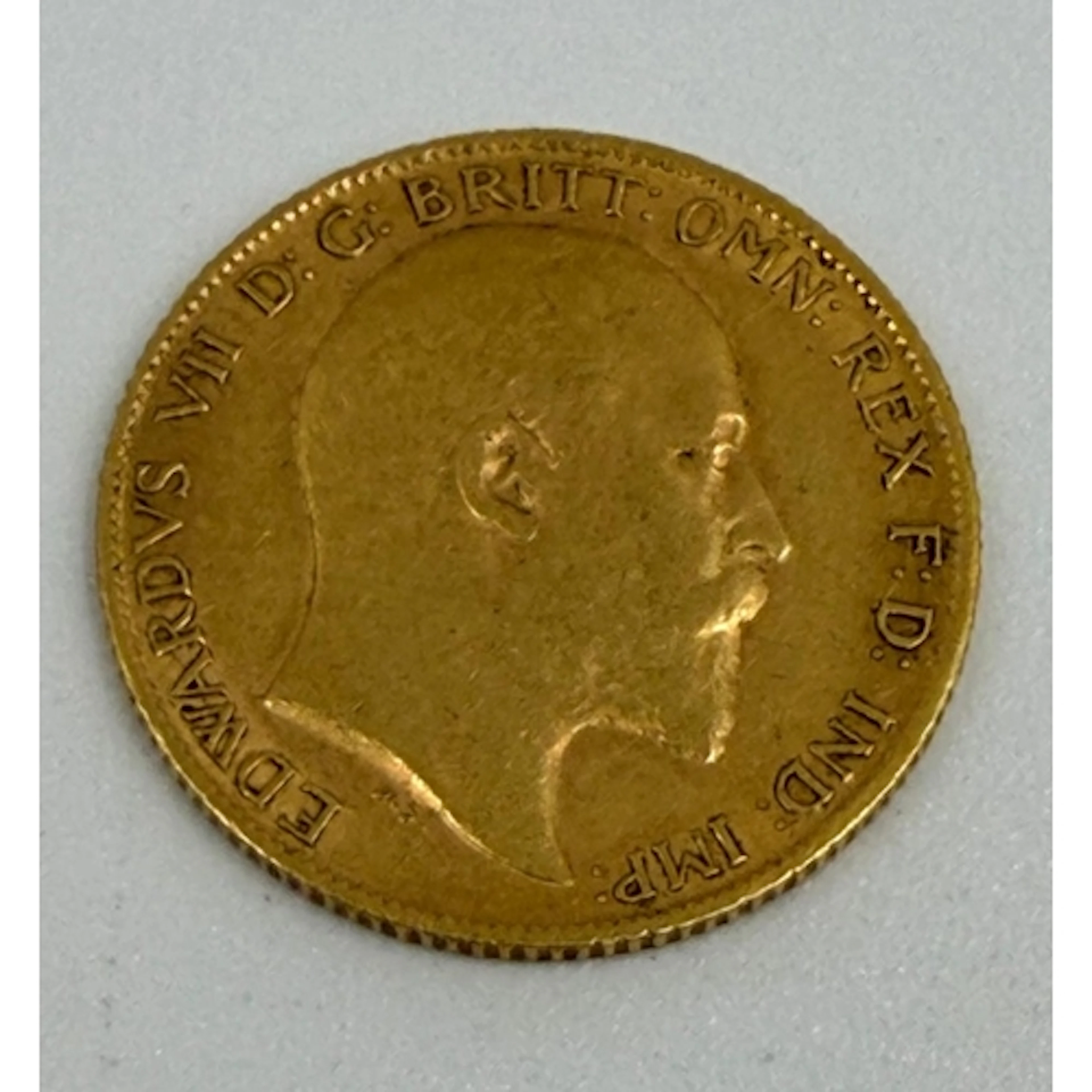A 1909 half sovereign gold coin