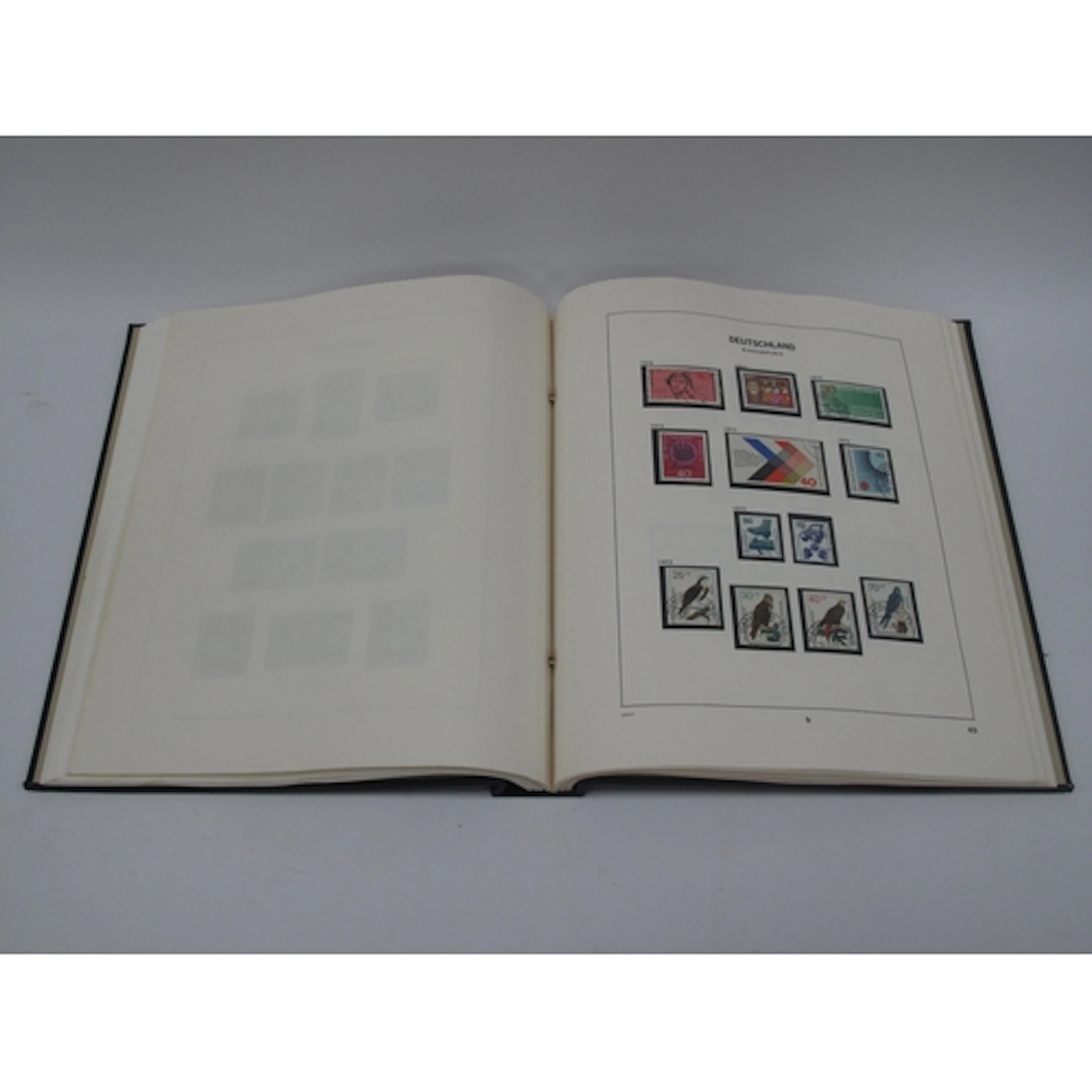 Stamps; West Germany stamp collection, housed in a Davo loos...