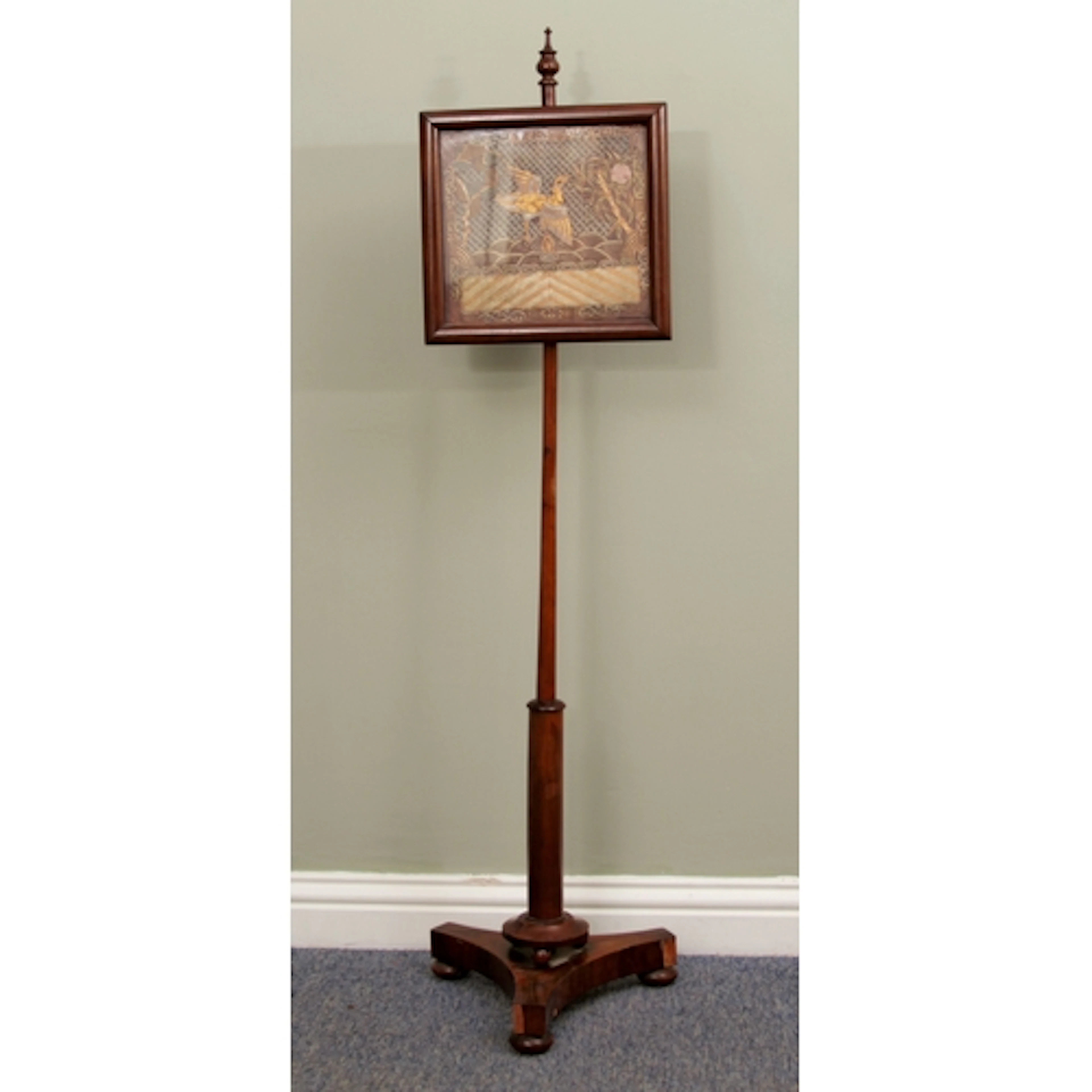 A mid-19th century yew and partridgewood wood pole screen - ...