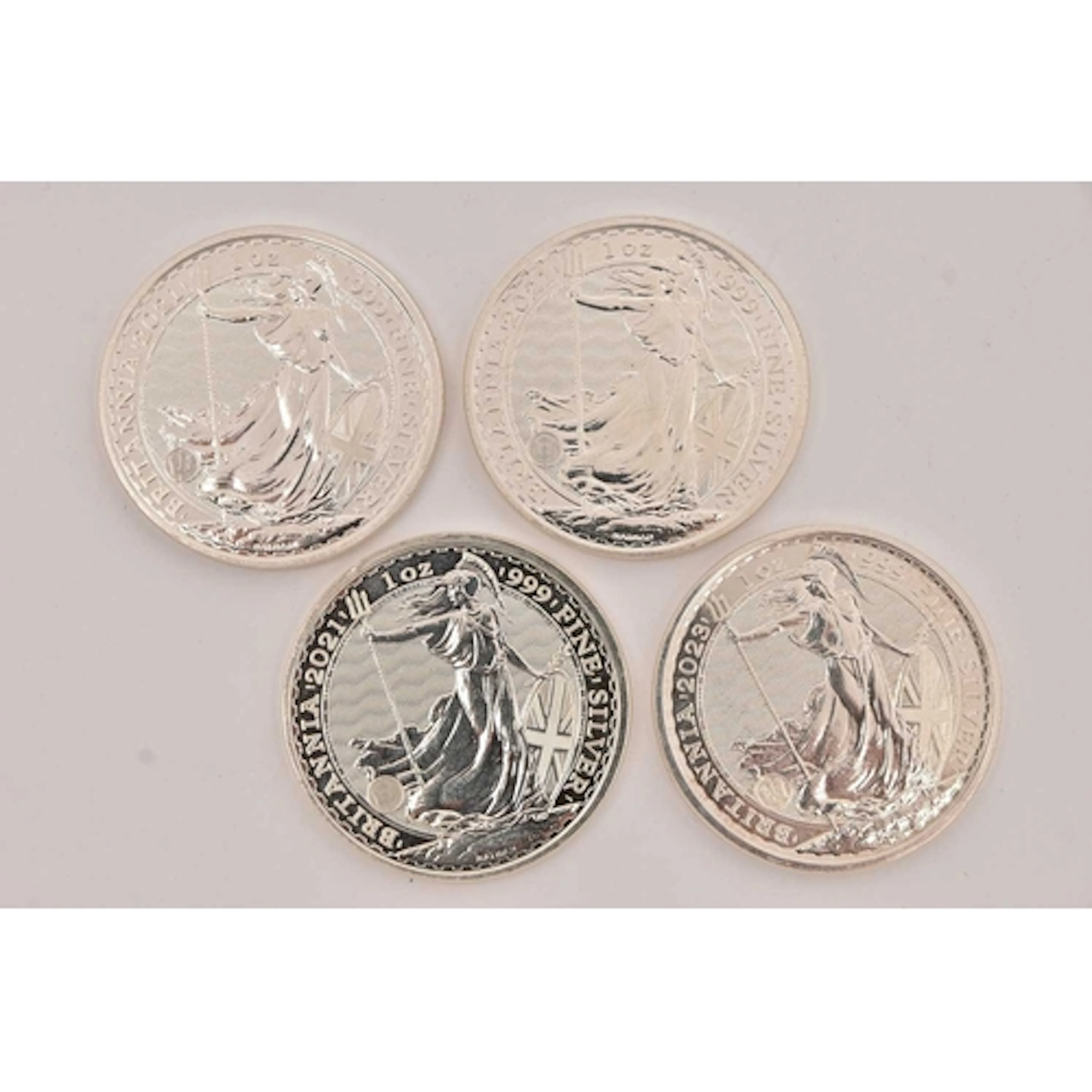 FOUR BRITANNIA 1OZ 999. FINE SILVER £2 POUND COINS, three da...