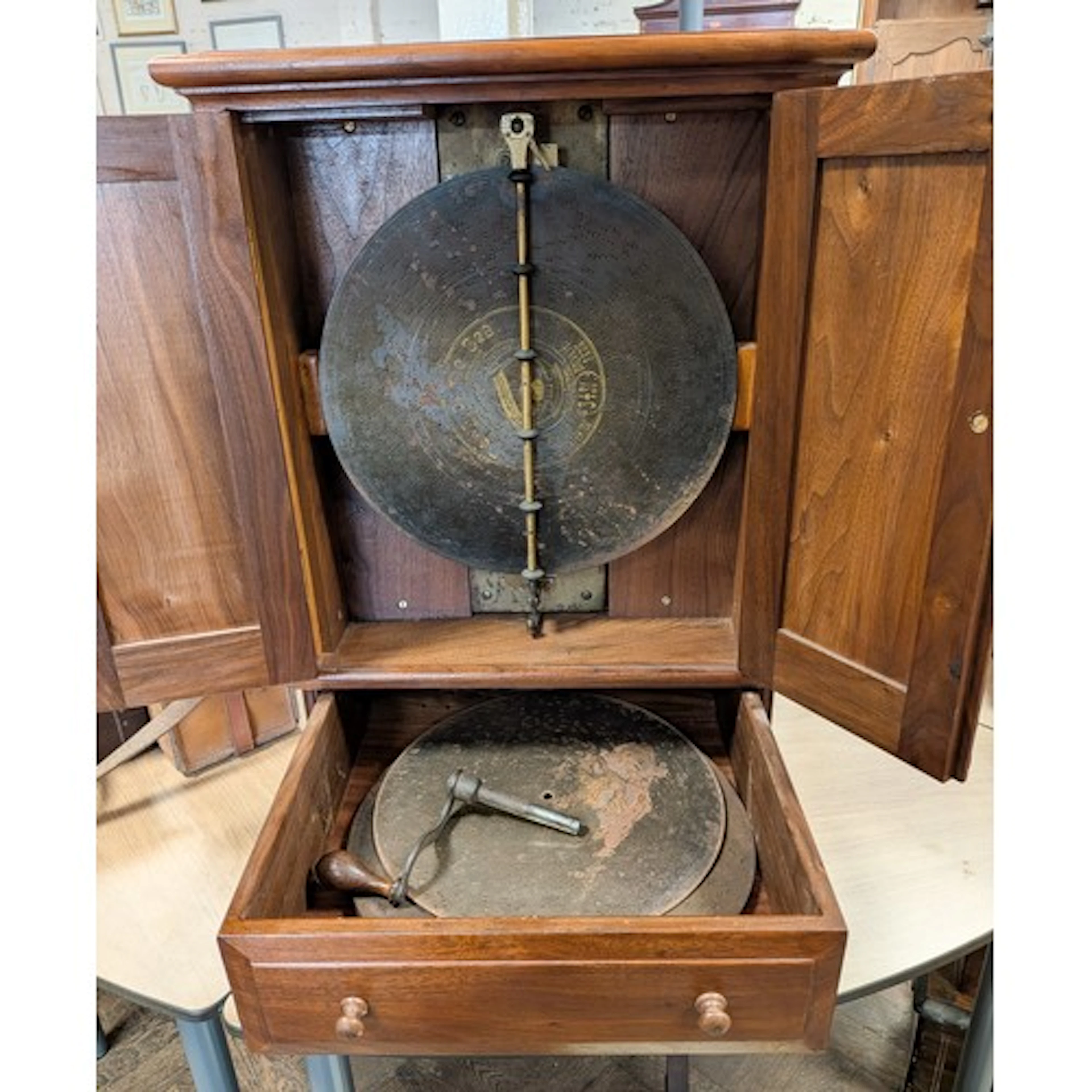 A late Victorian polyphon in walnut cabinet, 16 1/2" wide x ...