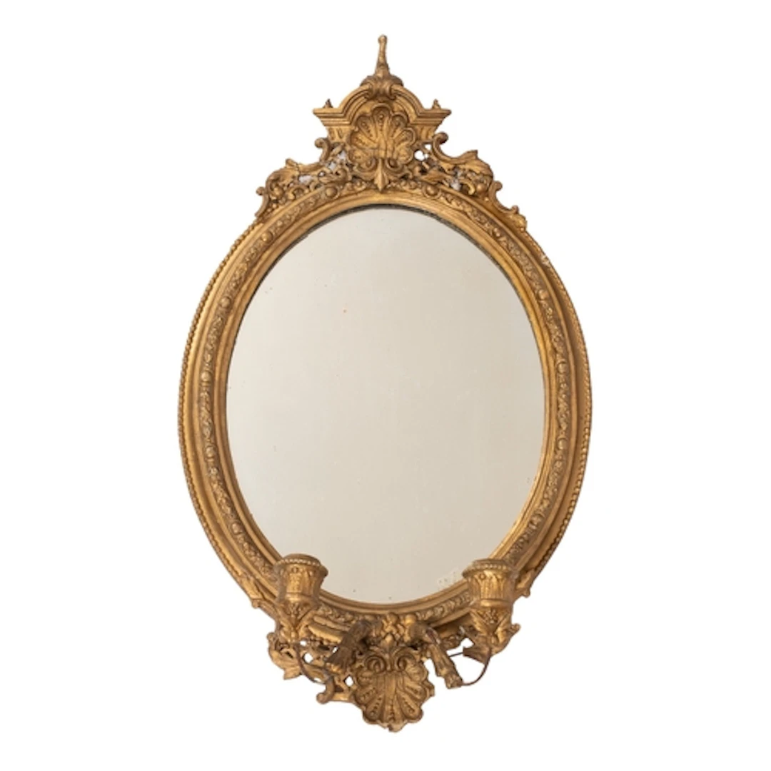 A gilt composition framed oval twin-light girandole, in 18th...