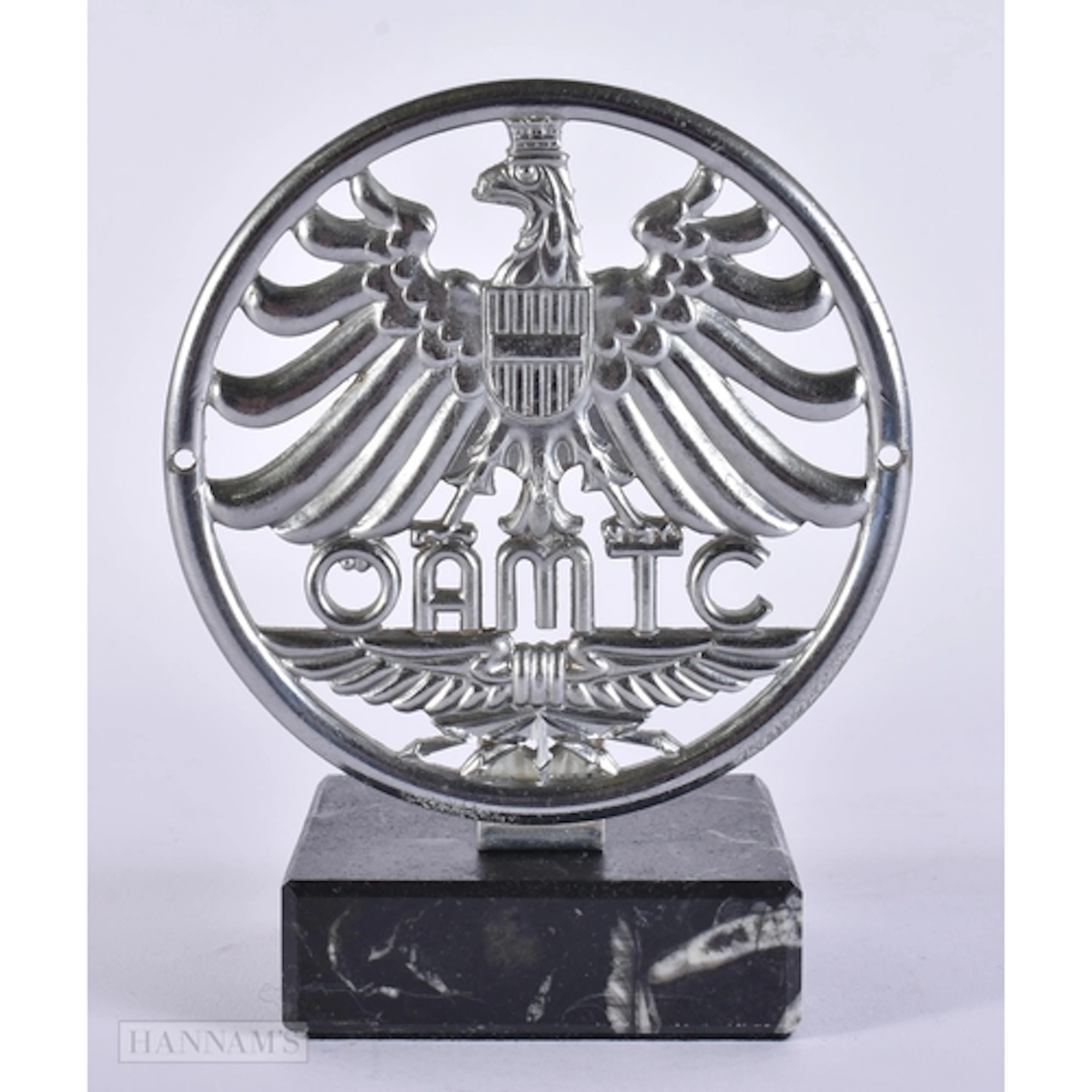 AN AUSTRIAN OAMTC MOTORCYCLE TOURING CLUB BADGE. 9.25 cm wid...