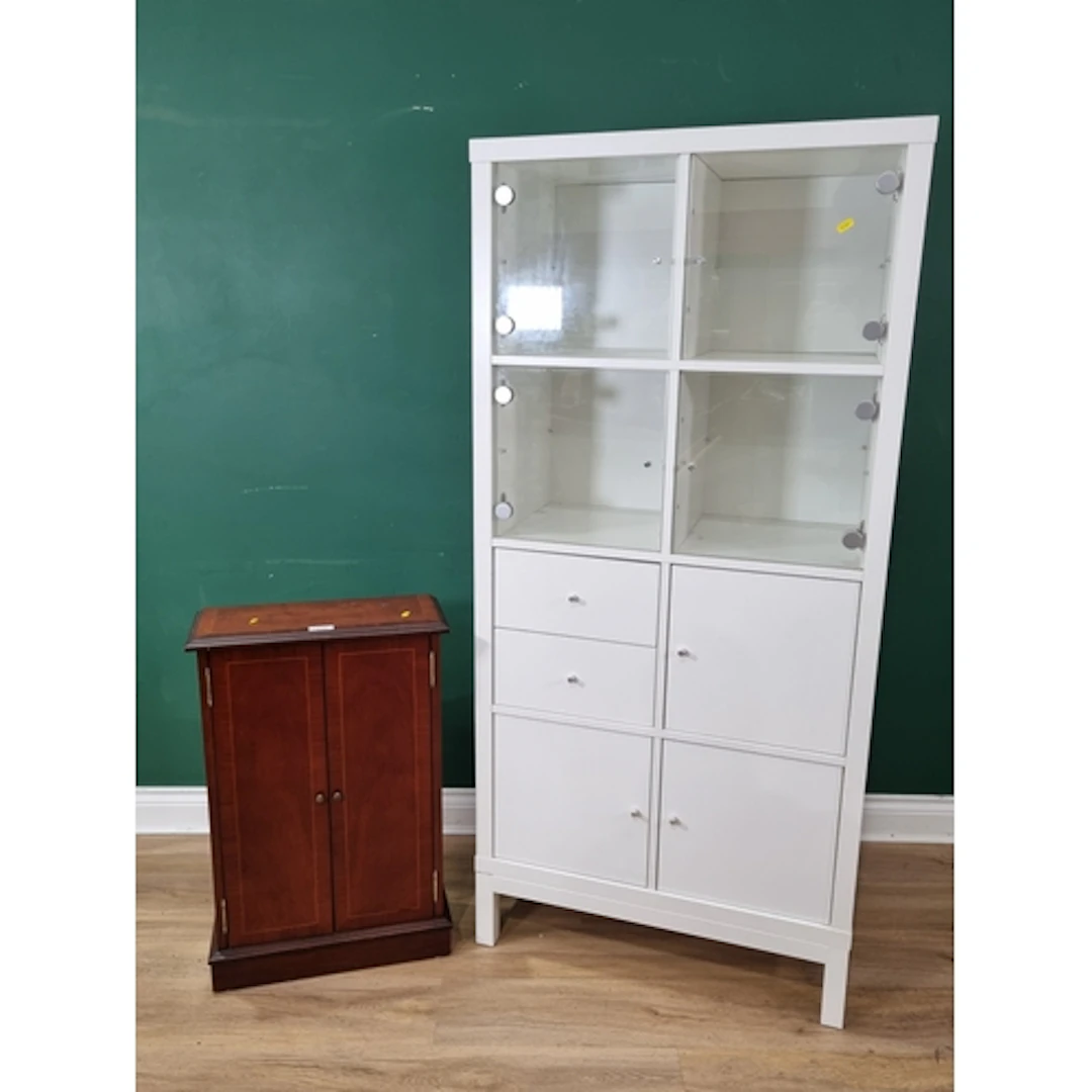 A modern white Storage unit and a reproduction CD Cupboard, ...