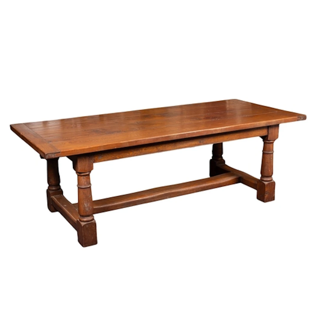 A substantial oak dining table in 17th century taste, 20th c...
