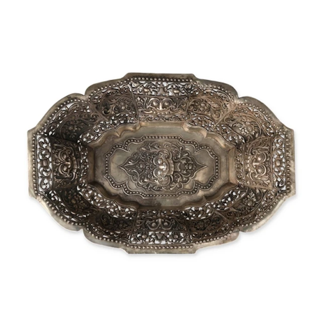 A FINE BALINESE PIERCED, REPOUSSED SILVER OFFERING DISH, CIR...