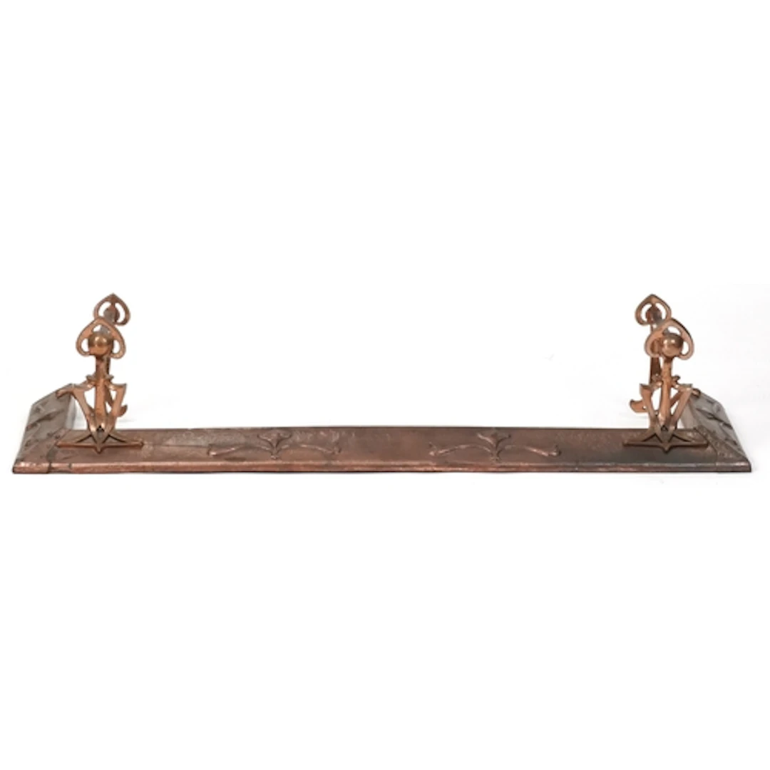Arts & Crafts copper fender with embossed stylized decoratio...