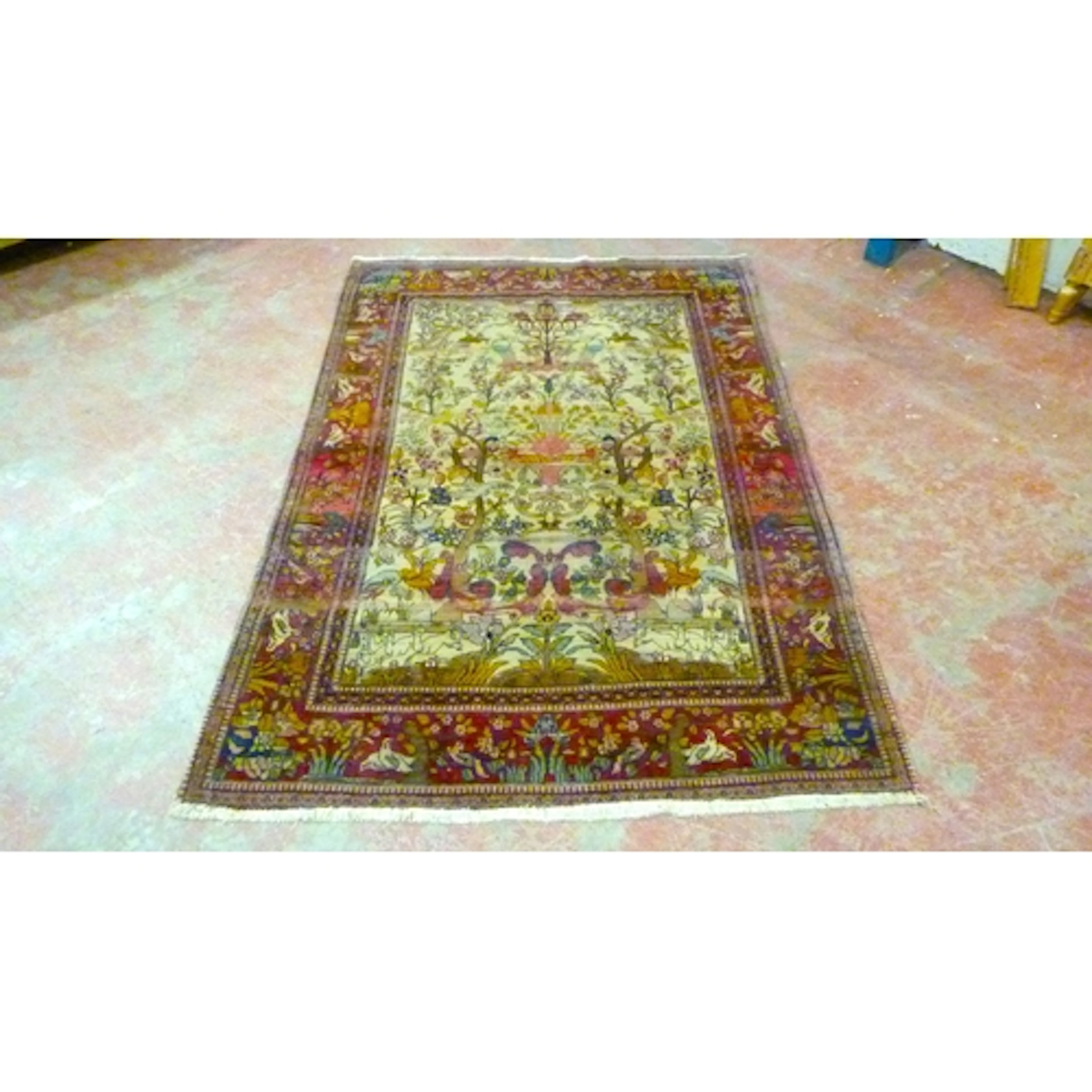 Persian Isfahan Tree of Life design silk rug, Adorned with b...